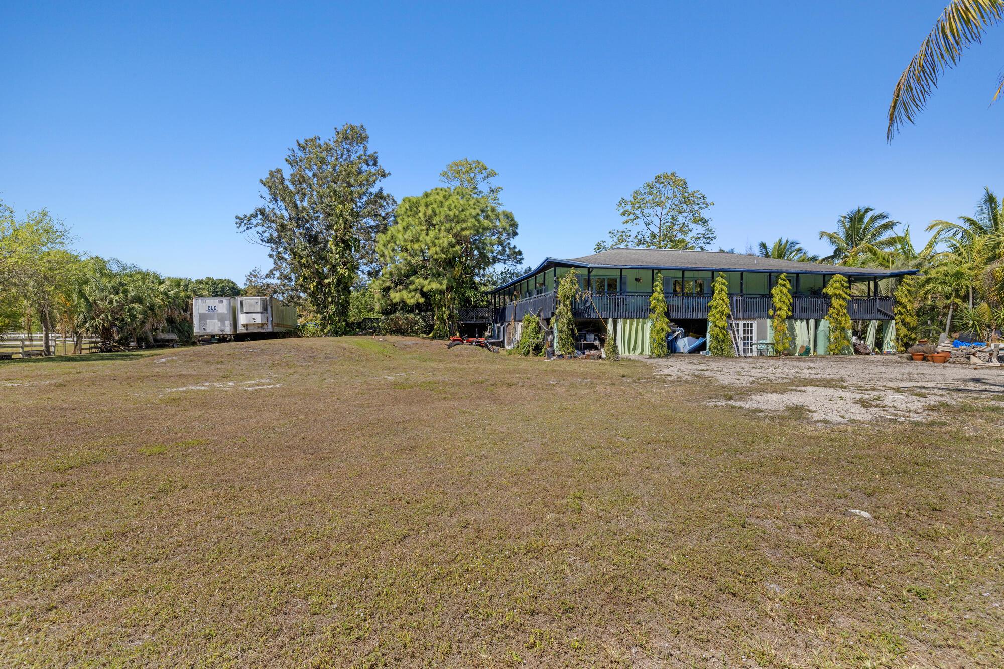 Homes for sale in The Acreage, FL | 19864 King Fisher Lane, The Acreage, FL 33470 | MLS# R11072336