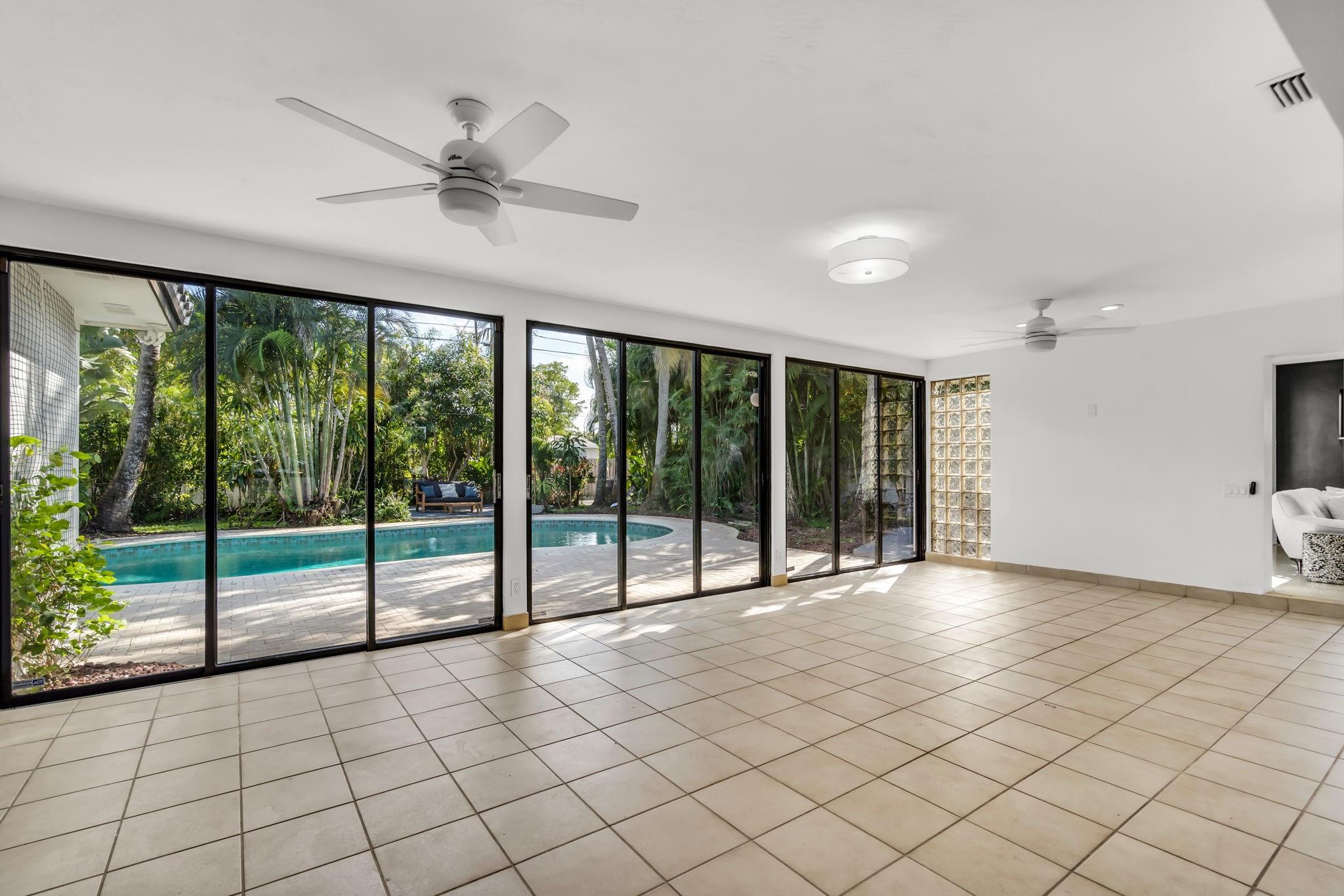 Full of natural light, huge family room with sliding door to Pool