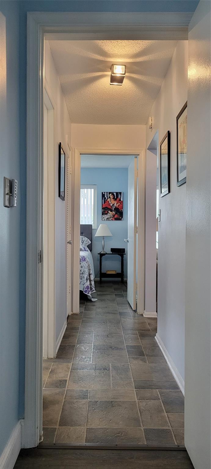 Hallway view from back bedroom to front