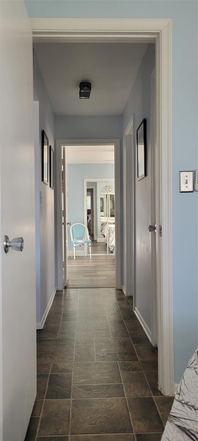 Hallway view from front bedroom to back