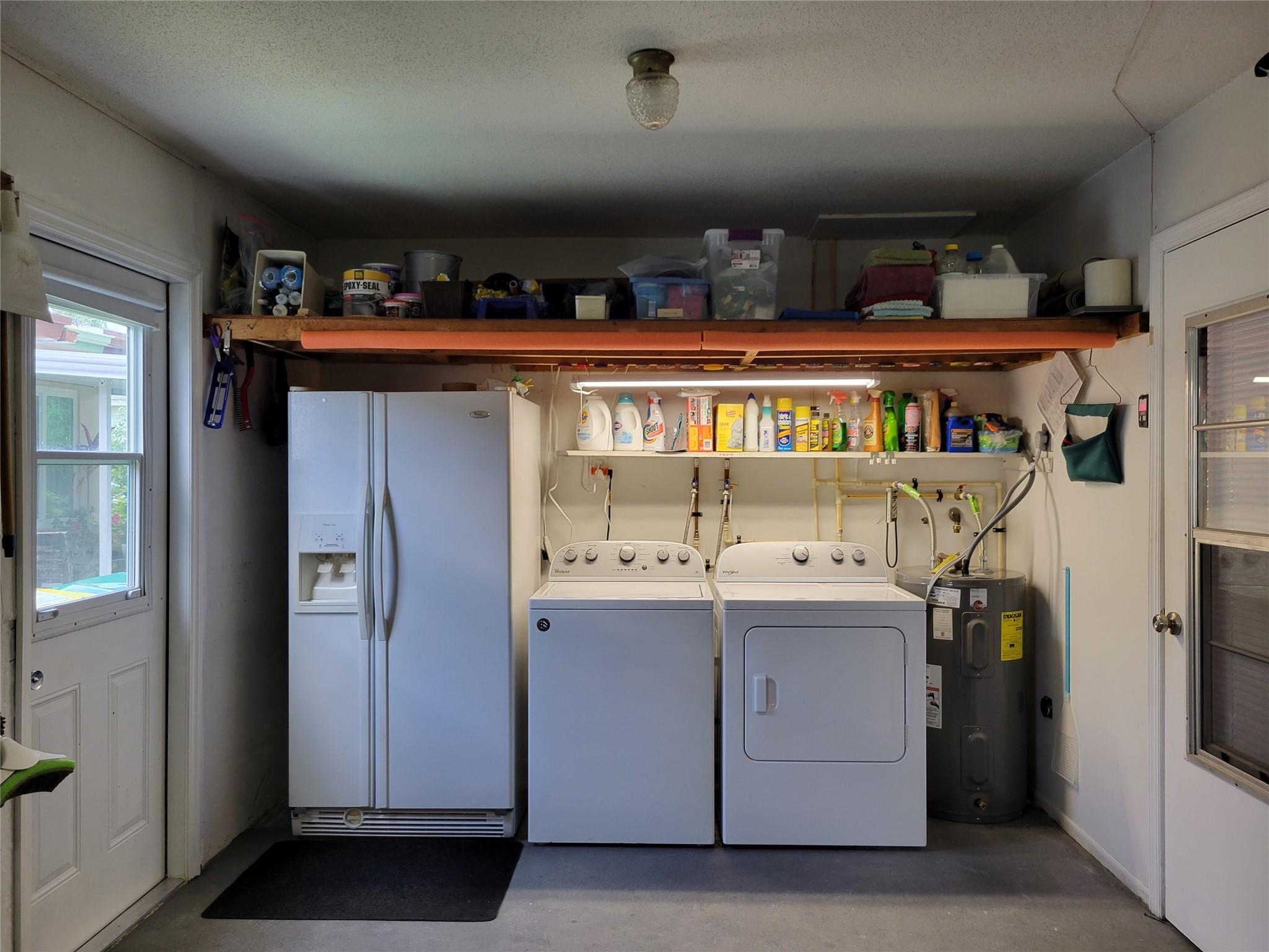 Back of the garage w second refrigerator