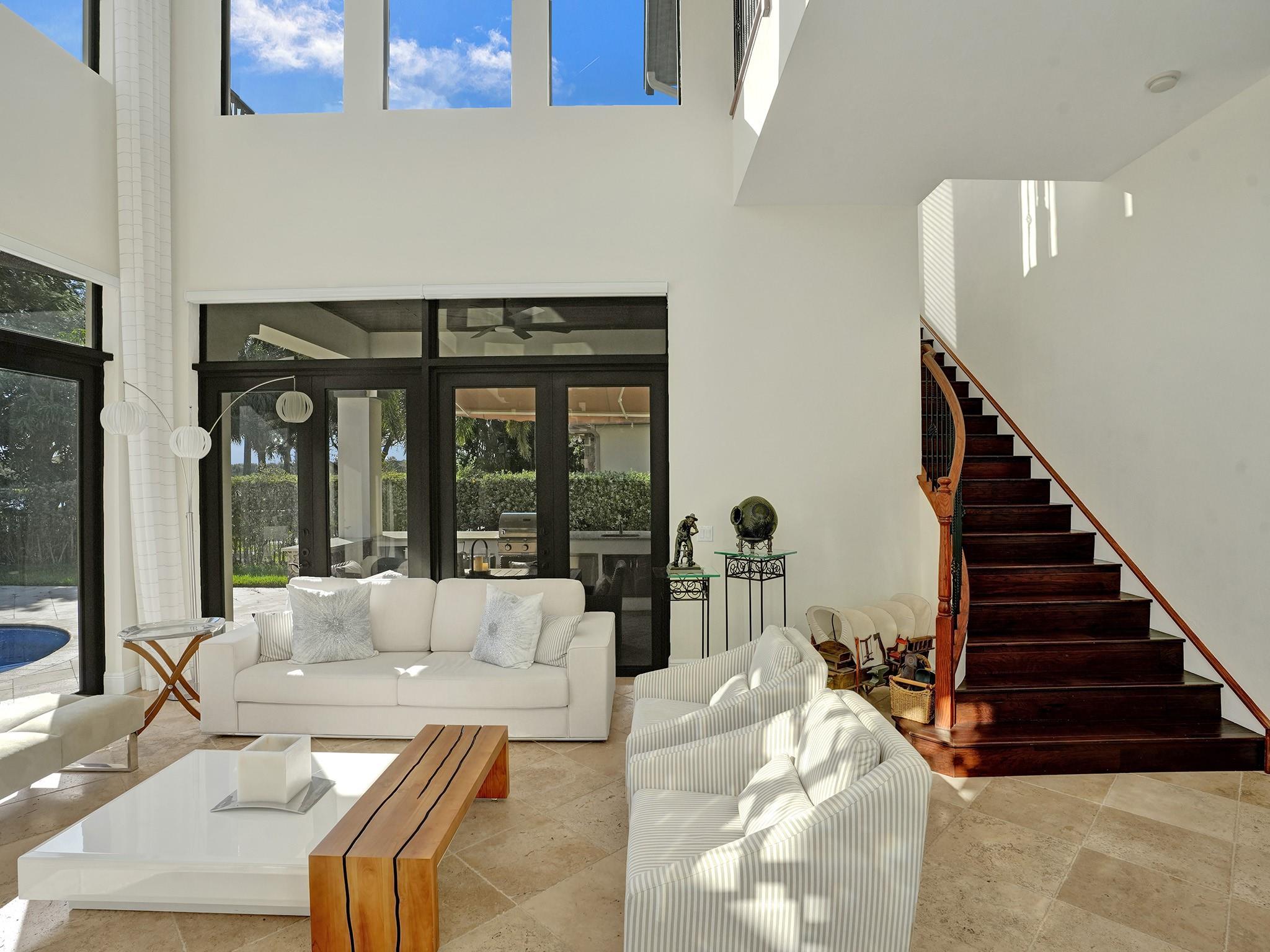 At the back, you can observe the outdoor kitchen area.