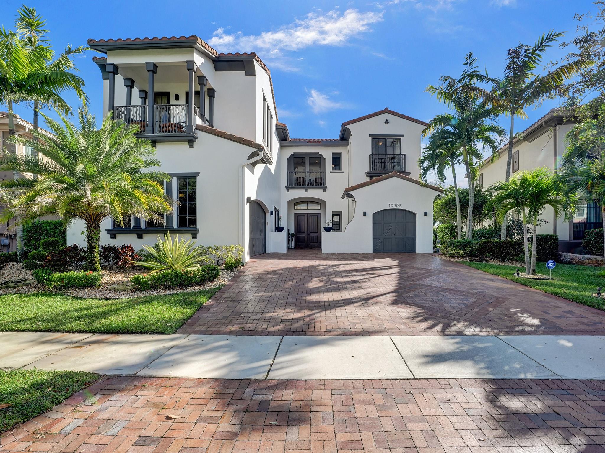 A generous driveway guides you to a 3-car garage equipped with a built-in tool closet. Multiple balconies enhance both charm and functionality in this nearly 5,000 sqft home.