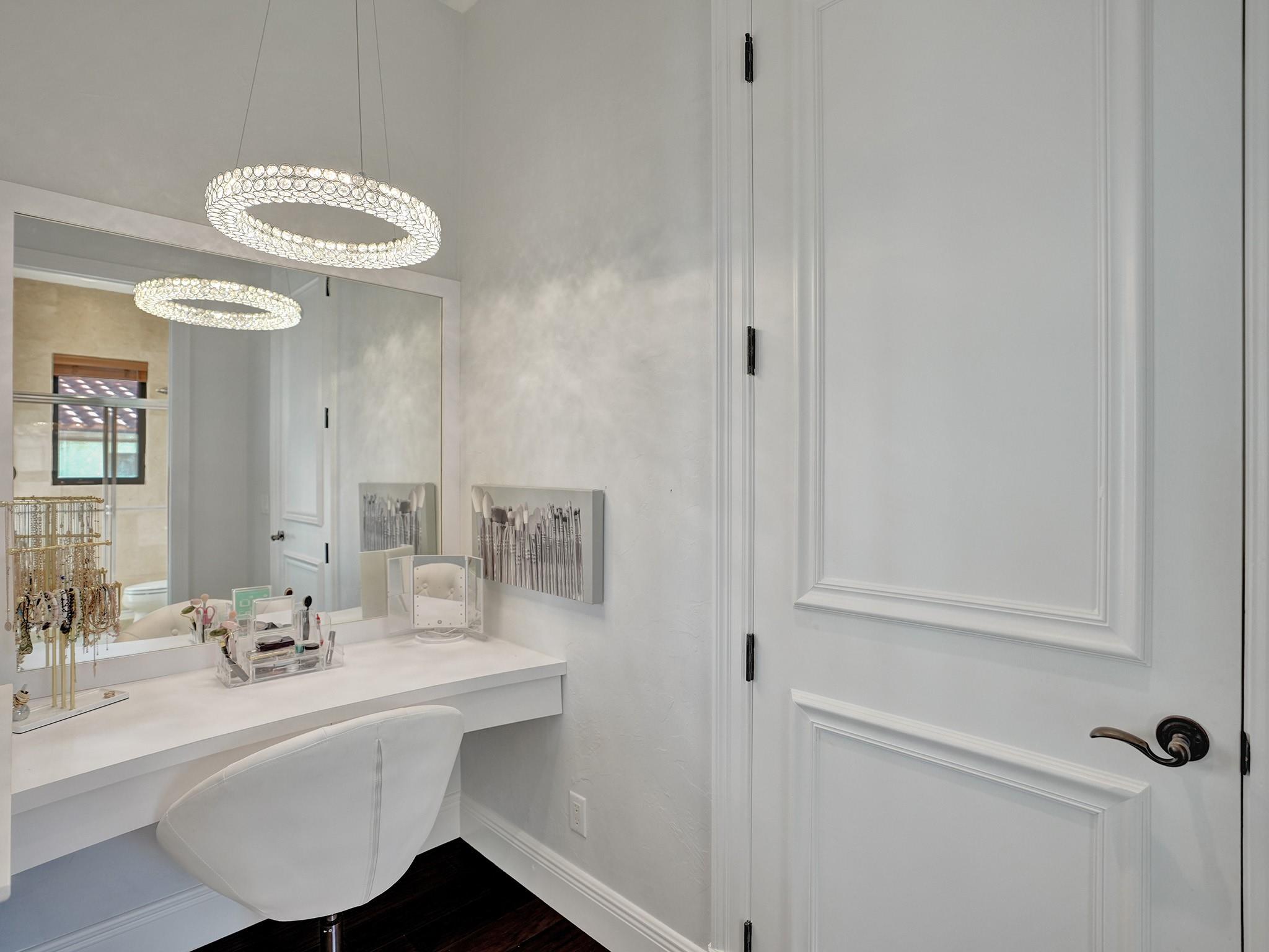 Enjoy your built-in, personal space featuring a beautiful and spacious mirror.