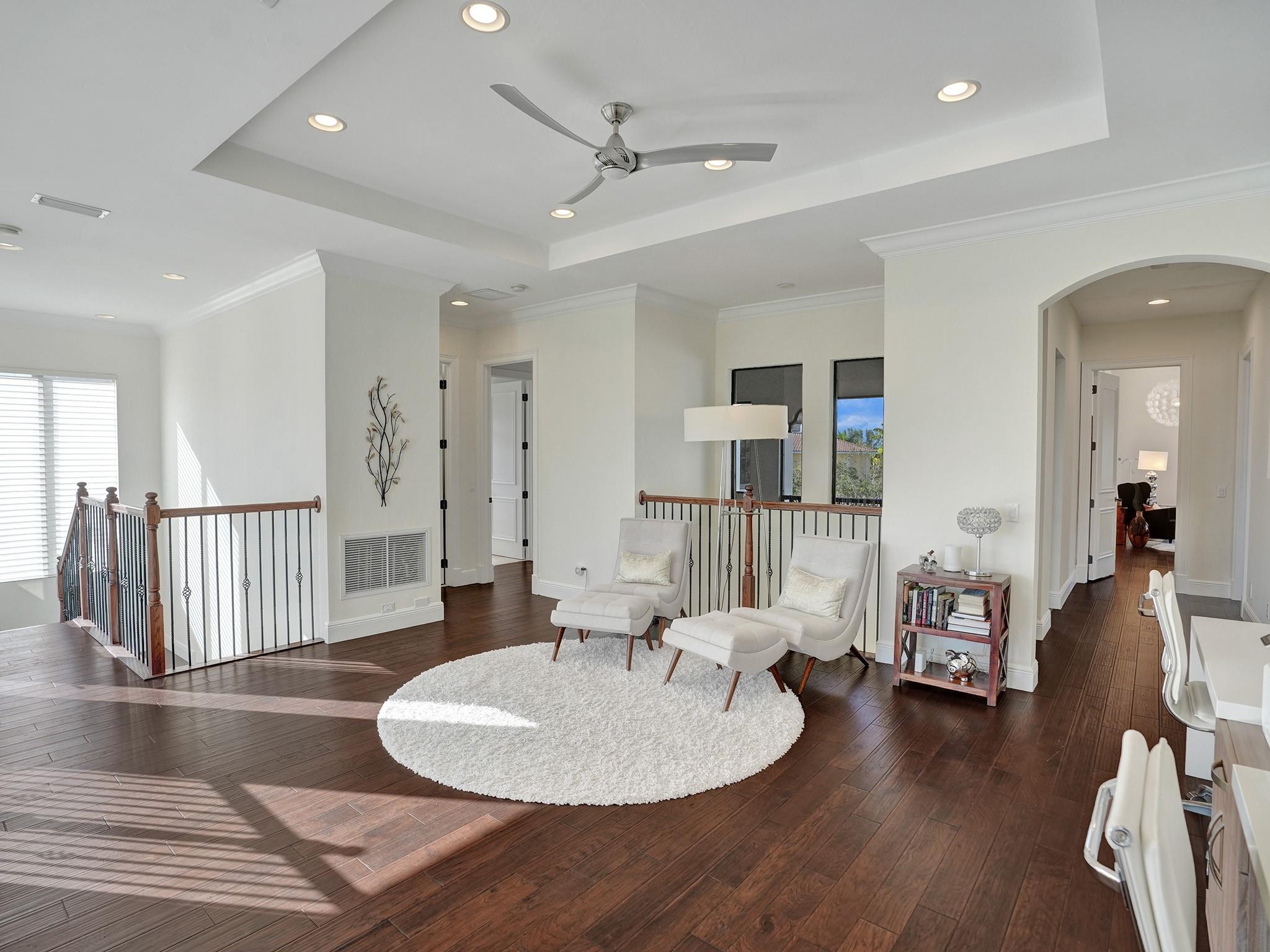 The balconies surrounding this loft bring in ample natural light.