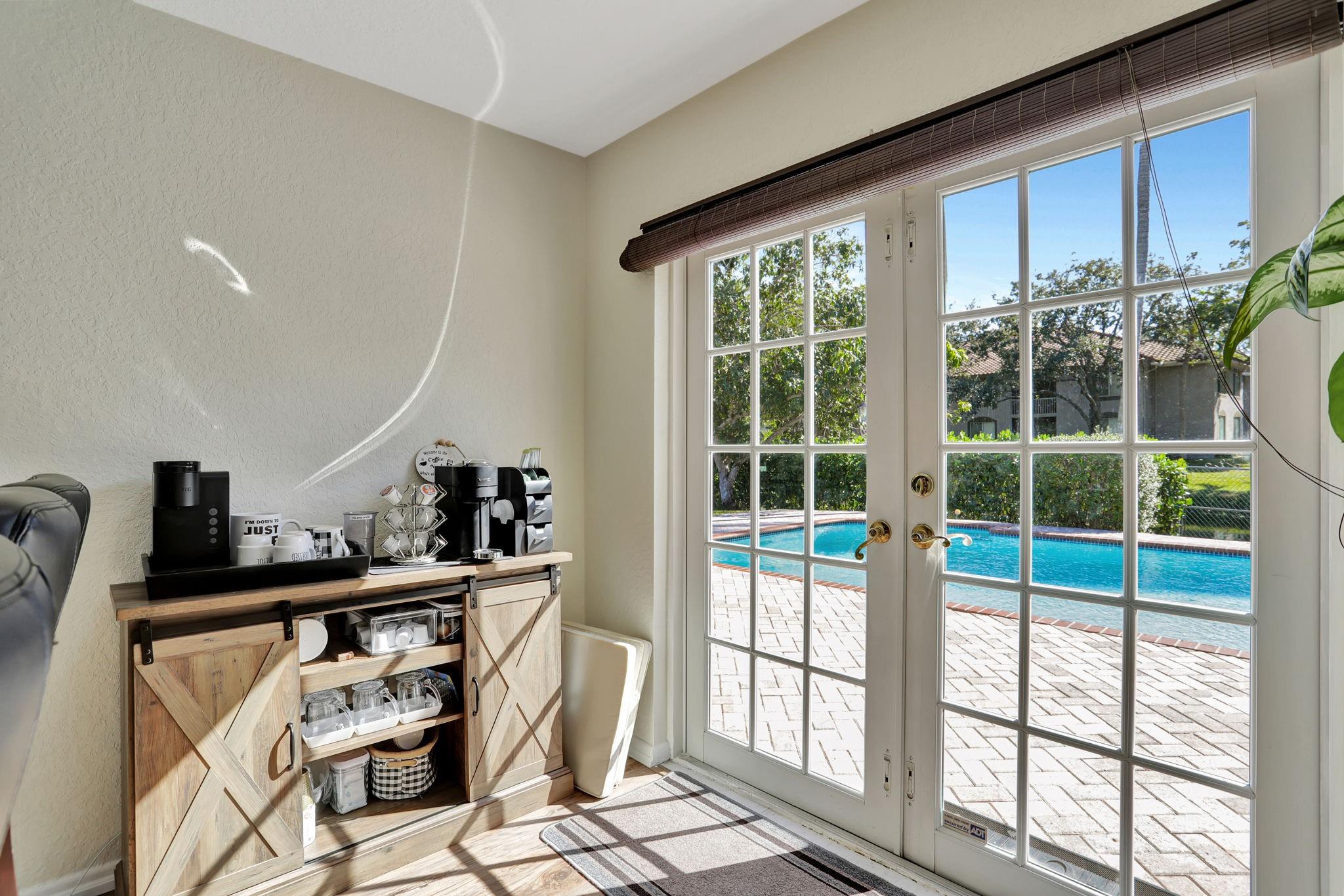 Kitchen eat-in area which leads to pool