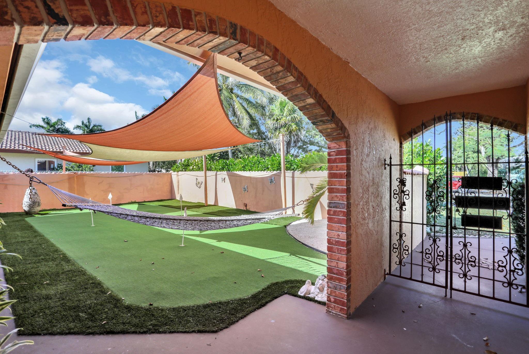 Front courtyard with putting green