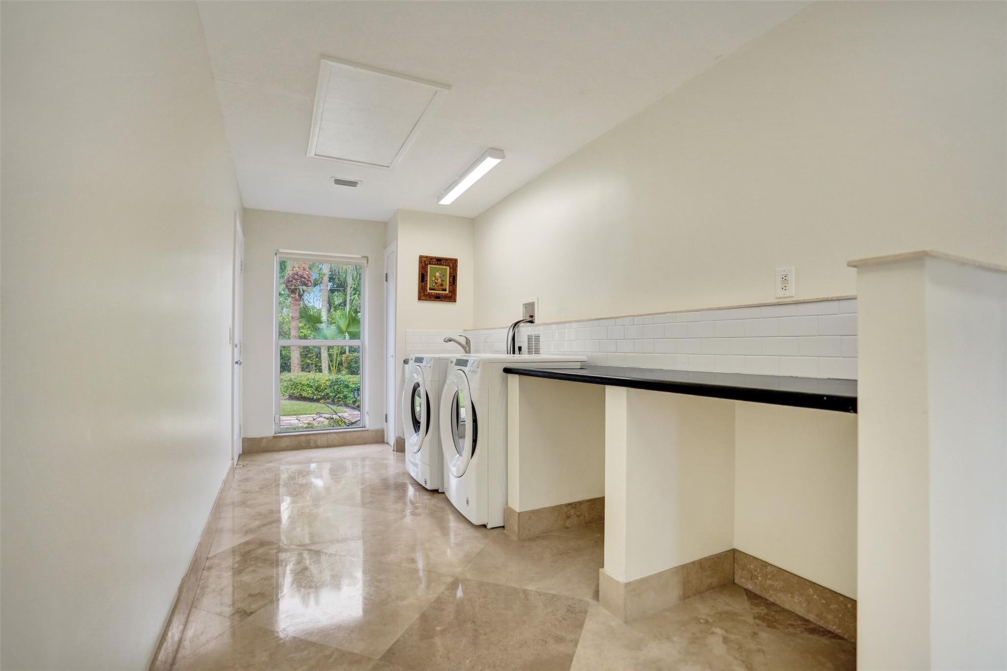 Oversized Walk-In Laundry Features Full Size Washer + Dryer + Wash Sink...