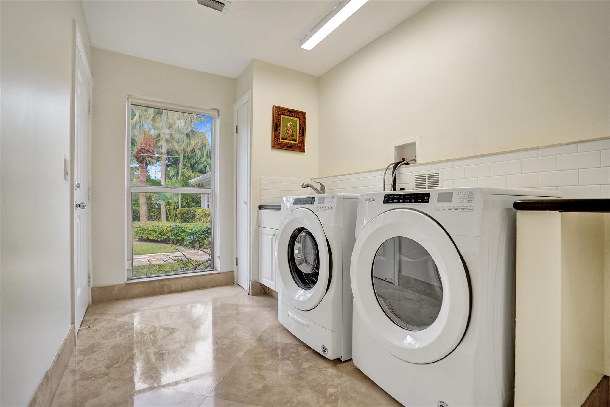 Oversized Walk-In Laundry Features Full Size Washer + Dryer + Wash Sink...