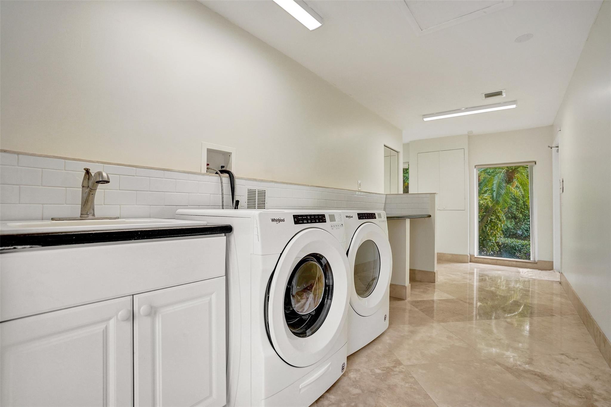 Oversized Walk-In Laundry Features Full Size Washer + Dryer + Wash Sink...