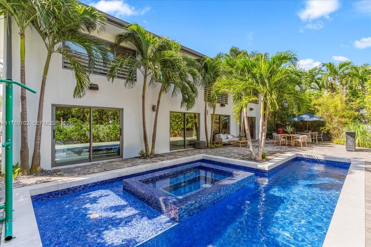 Enjoy Key Biscayne’s Island Lifestyle in this Gorgeous 6 Bedrooms 6 Bath modern home! Located on a very Desired Quiet street, One of the Few Gated homes on the Island! Ammenities include Pool & Outdoor Jacuzzi & Cold Plunge, Leaf Filtration Water System, Surround Sound System, Large Garden & BBQ Area & Indoor Steam room. Great entertaining Home Indoor & Outdoor , Kitchen is Chef's Gourmet with Viking appliances overlooking the pool area. The kitchen includes a double refrigerator, two freezers, gas ovens, oversize gas range, grill & free-standing wine cooler. The house has modern impact doors and Windows throughout. The first floor includes the Master bedroom with oversized walk-in closet, and a separate TV room that can be converted to a 7th bedroom if needed. Plenty Of Parking /Car Port!