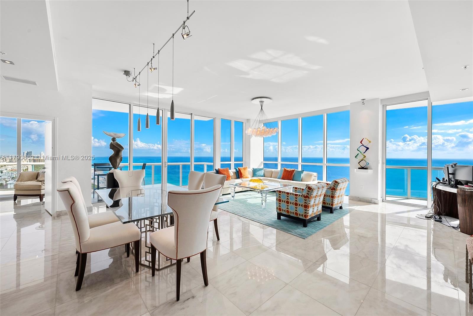 Experience uninterrupted ocean vistas from this bespoke residence masterfully curated by RGR Interior Architecture. A rare opportunity to own in the most sought-after line of the prestigious Continuum North Tower, this exquisite 3-bedroom, 3.5-bath home offers breathtaking, panoramic views from every room. Step off your private elevator into a light-filled sanctuary featuring 10-foot ceilings, pristine marble floors, and exceptional living spaces designed for both refined entertaining and everyday comfort.  Blending sophistication, serenity, and high design, this exceptional residence is complemented by the world-class amenities and five-star services that define the Continuum lifestyle.