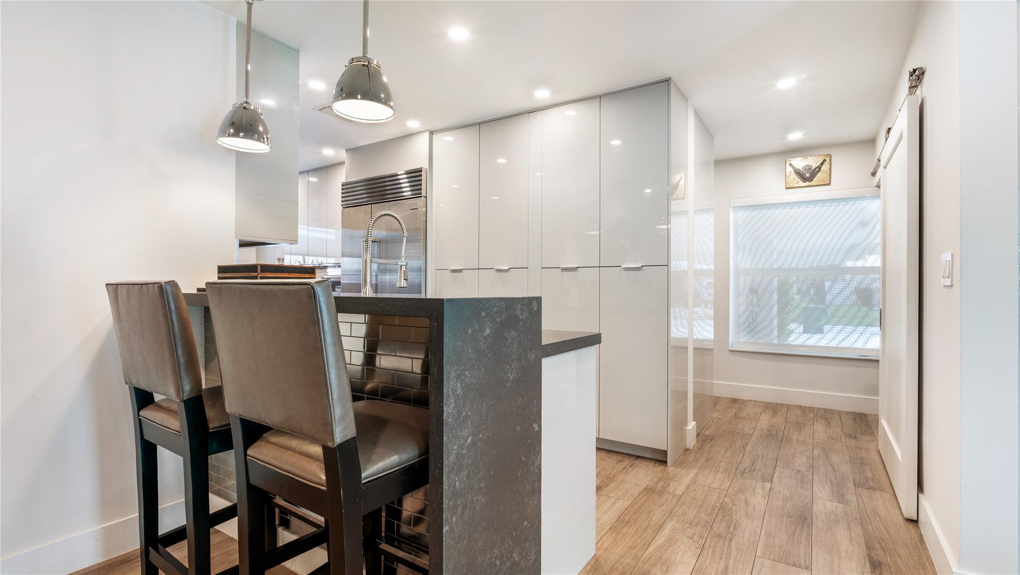 Gourmet kitchen with Wolf, Sub Zero + Franke appliances