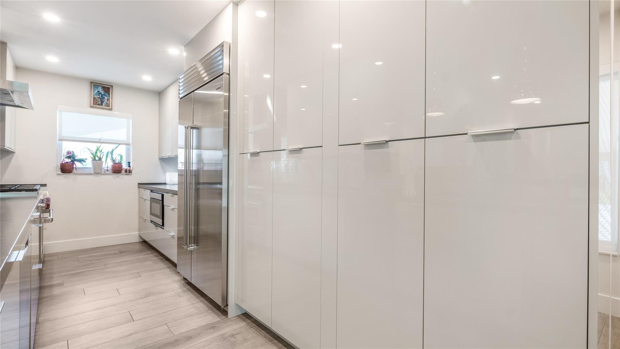 Gourmet kitchen with Wolf, Sub Zero + Franke appliances