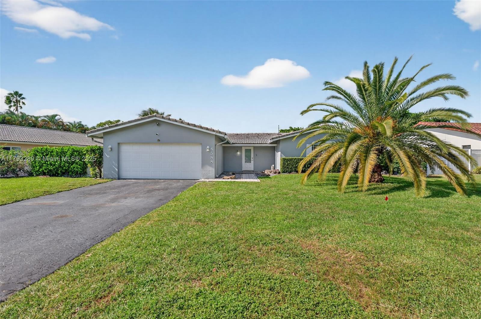 House for Sale in Coral Springs, FL
