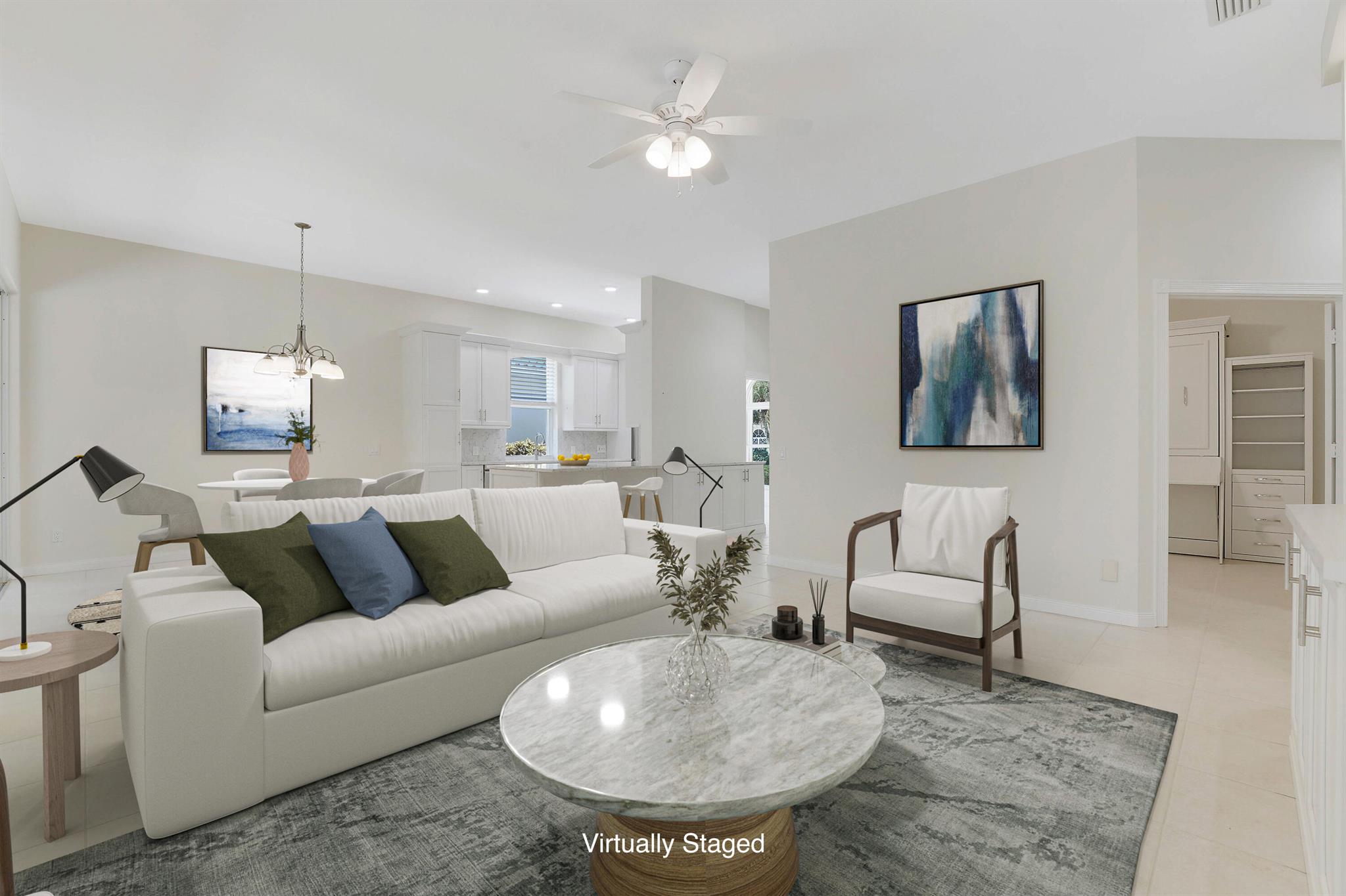 Nestled within the highly sought-after Oaks East Community of Palm Beach Gardens, this 3-bedroom, 2-bath home offers an exceptional lifestyle in a serene setting. The community is surrounded by several tranquil lakes, mature oak-lined streets, and a community clubhouse & pool nearby. The home has a layout designed for comfort and functionality with several upgrades and renovations to include; completely redesigned kitchen with LG appliances,  modernized wall unit in the living room, one of the guest bedroom includes a versatile Murphy bed/desk combo, the patio is enclosed with hurricane rated sliders offering a Florida room for additional entertaining space. Come see this single family, Divosta built home today!