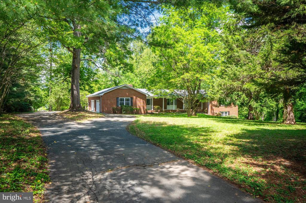 Luxurious Single-Family Home on a Large 2 Acre Lot. New Carpet, Hardwood and Luxury Vinyl Flooring, Upgraded Counter Tops, Primary Bath, Walk in Closets. Must See!