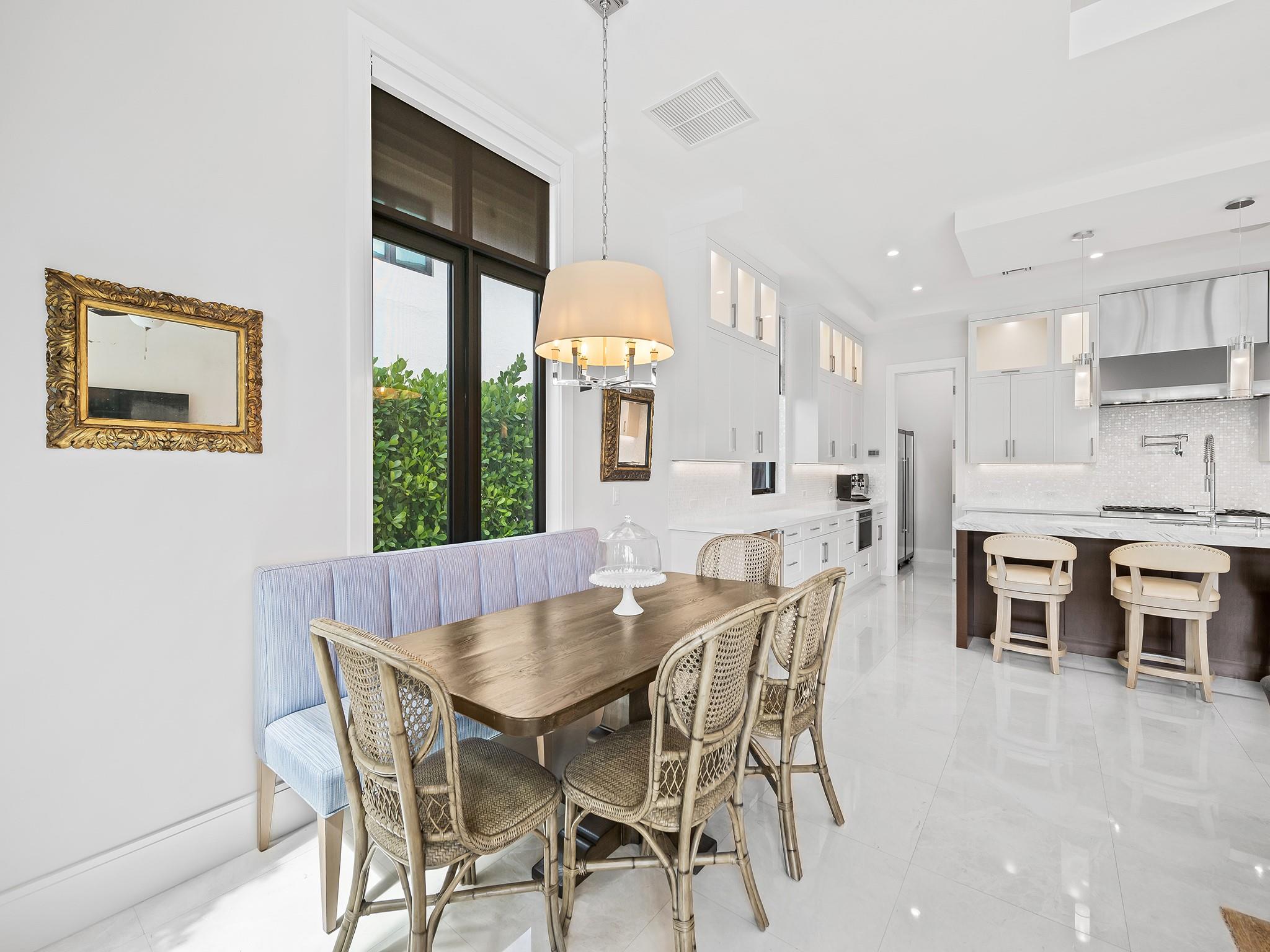 The casual dining area offers a relaxed and inviting space, perfect for everyday meal and family gatherings