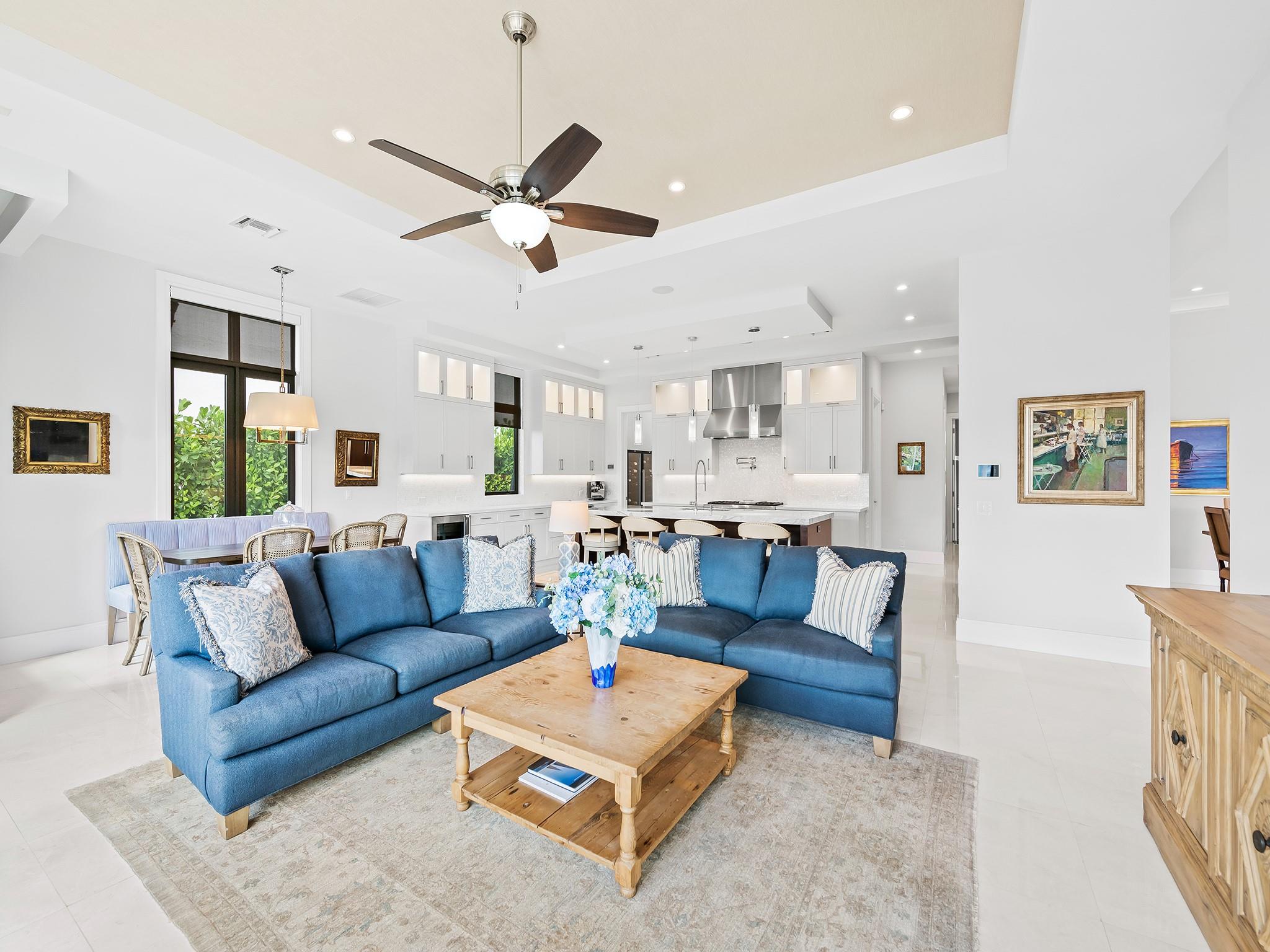 Elegantly positioned just off the kitchen, the family room is perfect for hosting lively gatherings and creating cherished family memories