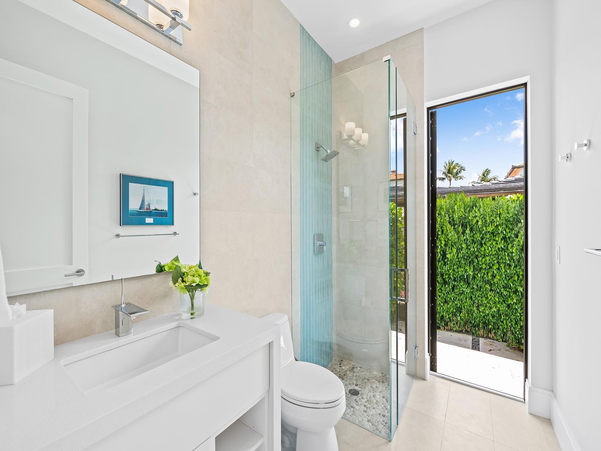 Downstairs bathroom. Next to media room.  Can be used as cabana bath as well