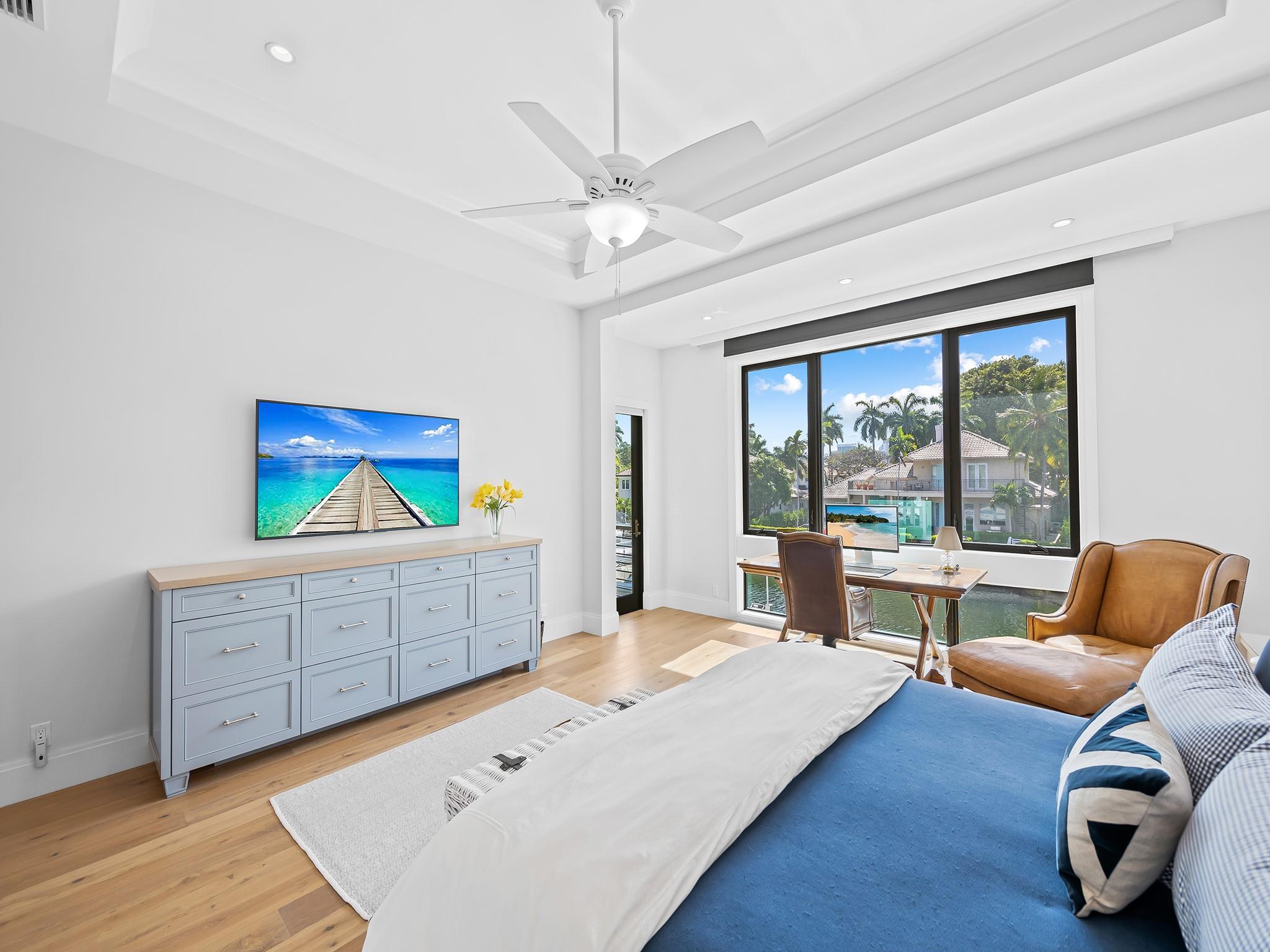 Ample natural lighting throughout the primary suite. Electric shades and blackouts