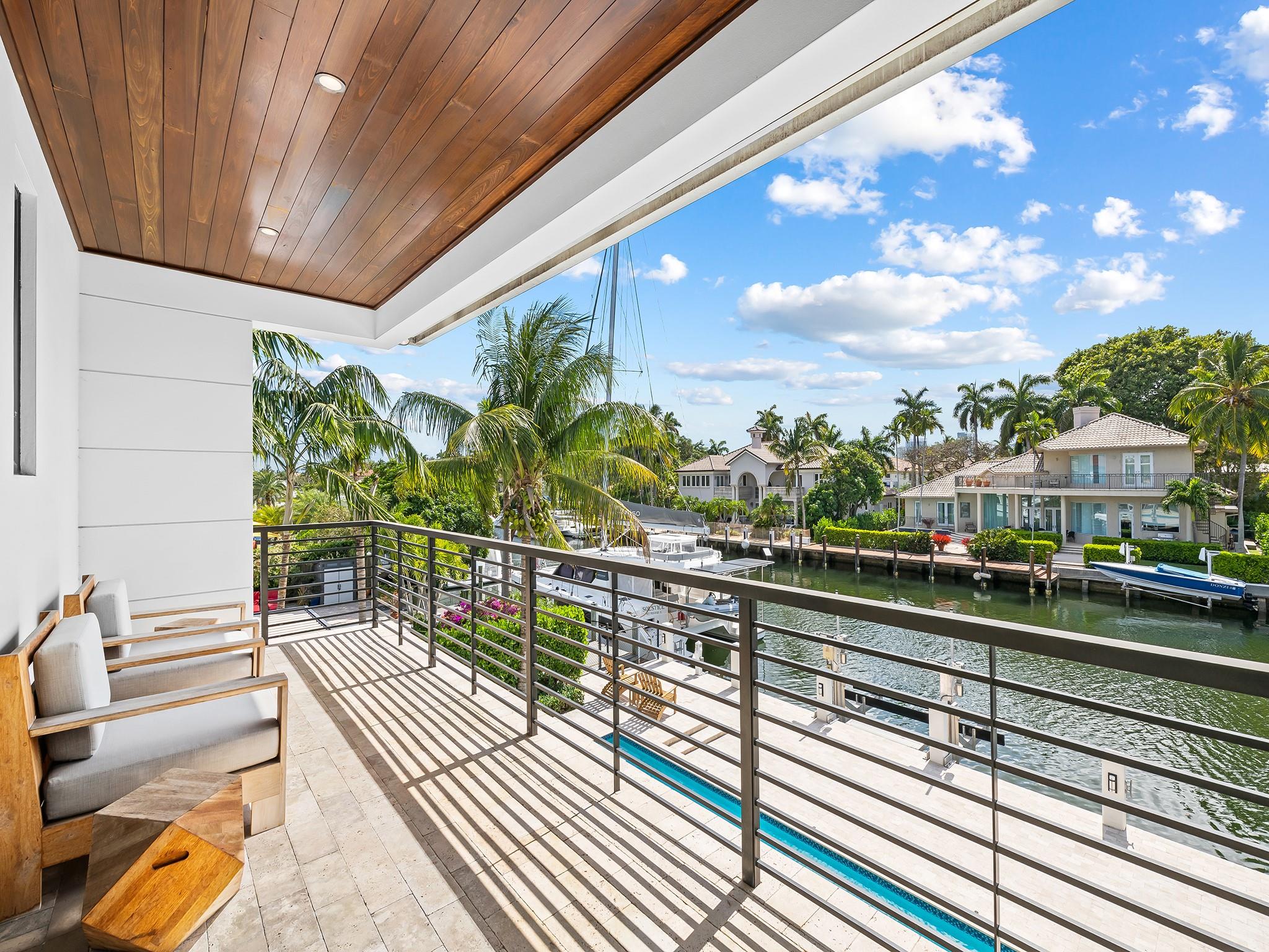 Private balcony overlooking the primary poolside, perfect for relaxation and stunning sunsets