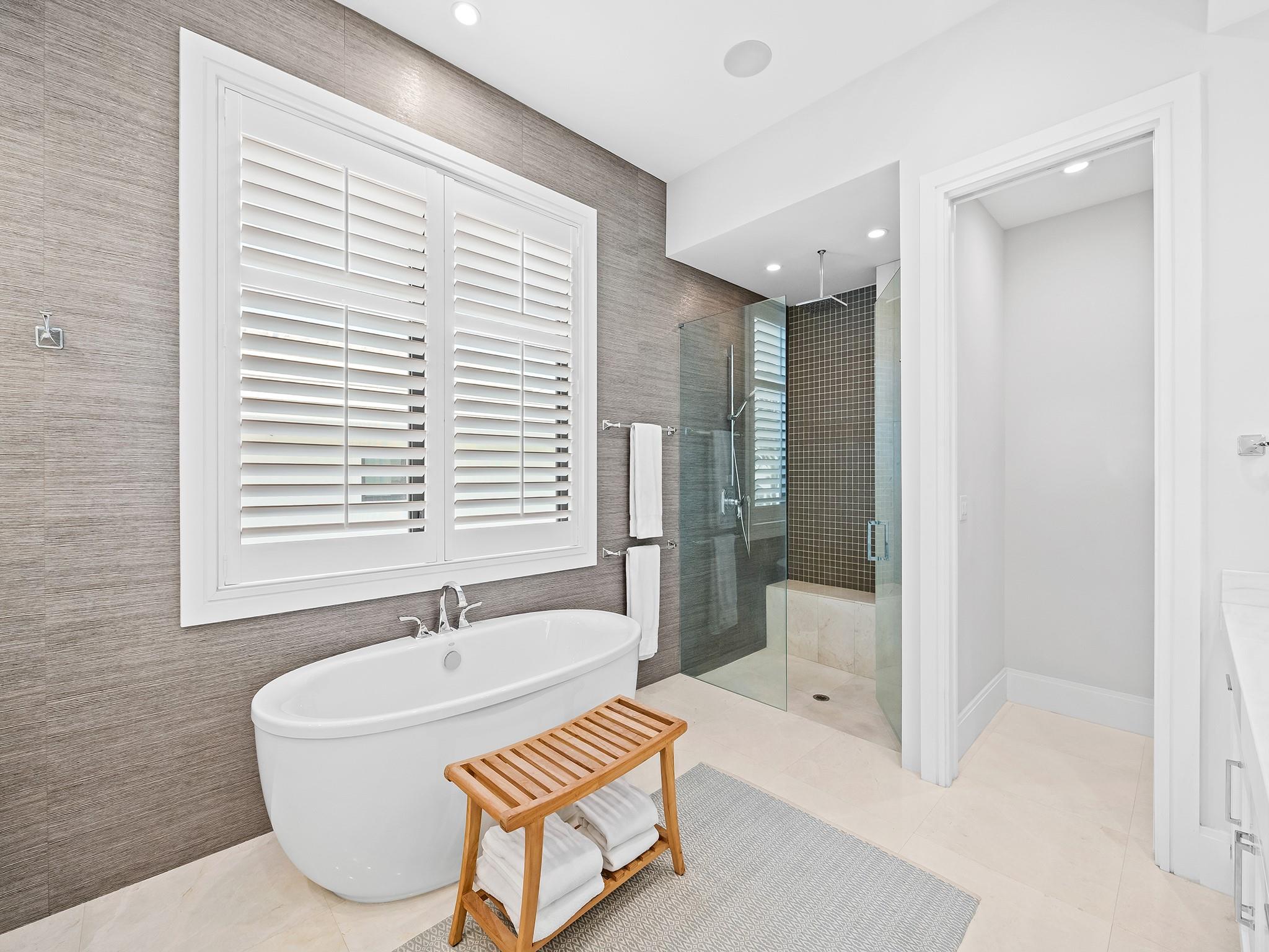 Enjoy the ultimate relaxation in your elegant standalone tub.