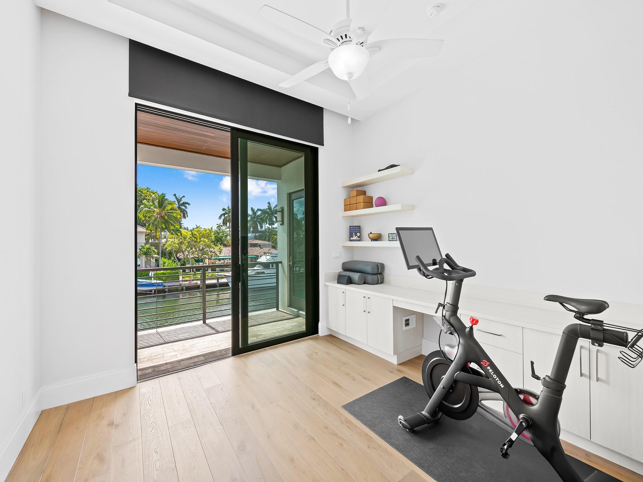 Bedroom or gym, another spacious room with plenty of natural light.  Electric blinds