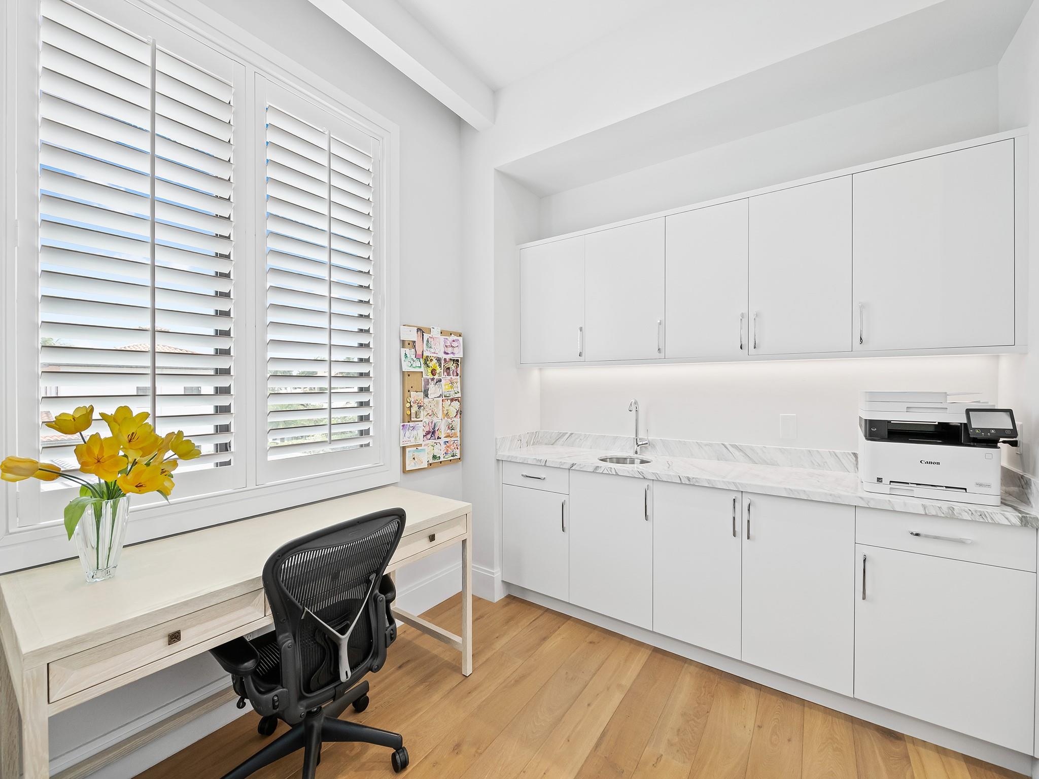 Your upstairs day office and coffee bar is just another bonus in this magnificent home