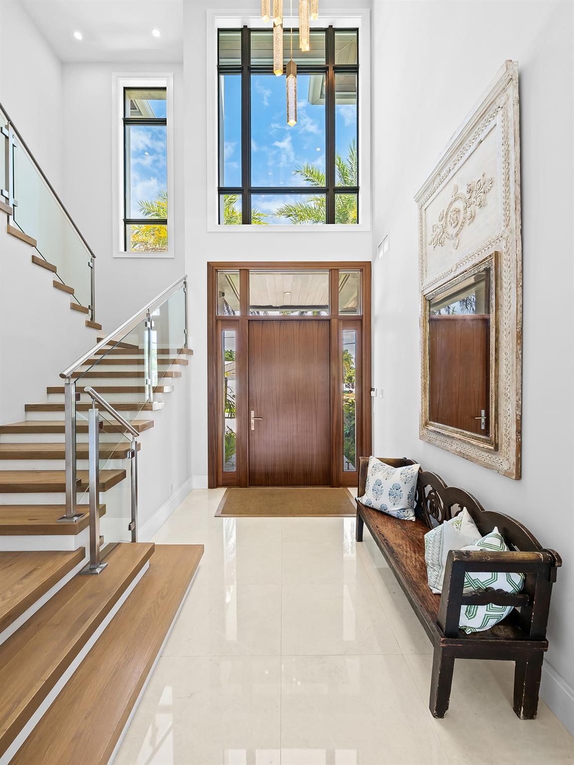 The elegant foyer sets the tone for the sophistication throughout the home