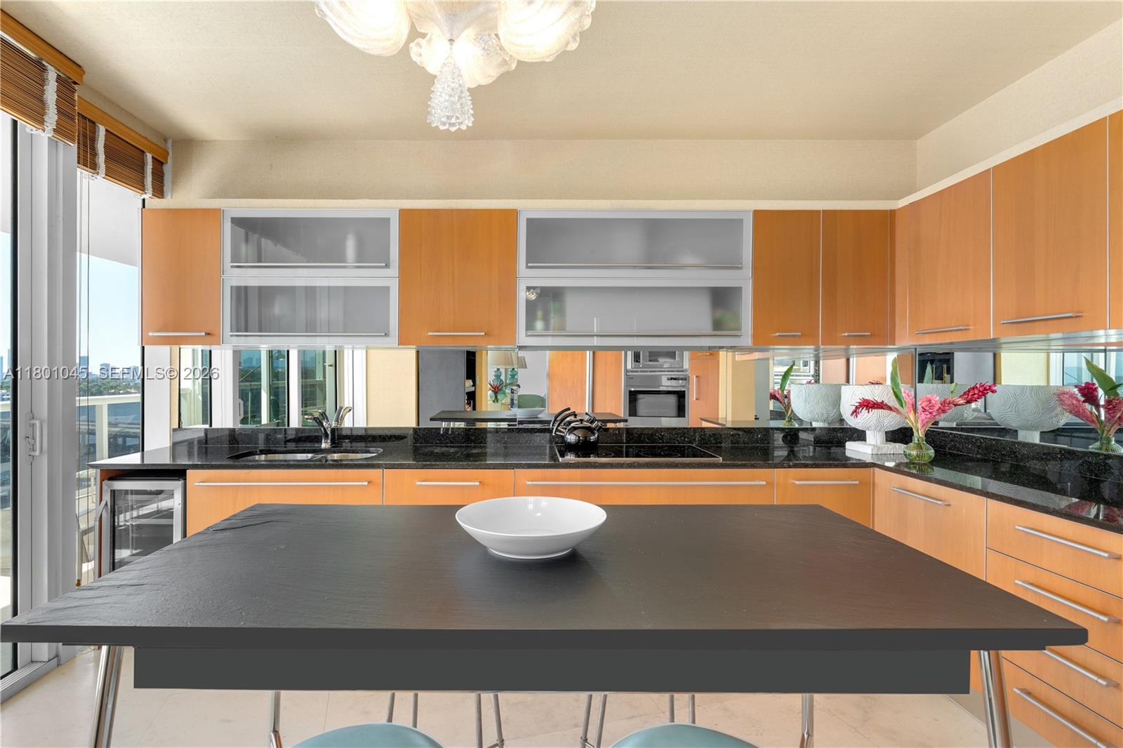 EASY TO SHOW! Welcome to The Palm Residence at Murano Grande by Lorin Marsh, located at 400 Alton Road. This stunning 2-bedroom, 2.5-bathroom home spans 2,003 square feet and offers breathtaking panoramic views of Biscayne Bay and the vibrant city skyline. Enjoy a refined living experience with custom finishes, designer touches, and expansive interiors that reflect the essence of Miami Beach's natural beauty and urban energy. Residents have access to top-tier amenities including a pool, gym, tennis court, barbecue area, sauna, hot tub, and on-site restaurant. A private elevator, doorman, valet, and concierge services ensure seamless comfort and convenience. Discover luxury living at its finest in this exceptional residence in Miami Beach's South of 5th Neighborhood. 1 or more images are virtually staged