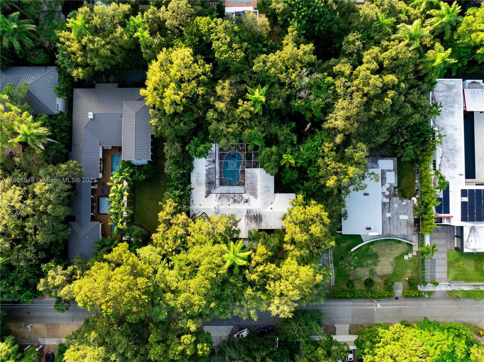 Set on one of North Coconut Grove’s most beloved oak-lined streets, this 20,000 SF mid-block lot offers a rare opportunity to create a signature estate among multi-million-dollar homes. The existing 3BR/2.5BA residence spans 2,604 SF with a pool and can be leased while you design and permit your future home. Enjoy a peaceful, walkable setting near bayfront parks and marinas, just minutes from the Grove’s village center with its cafés, boutiques, and galleries. Situated in a no-flood zone at one of South Florida’s highest natural elevations, with ideal access to downtown, MIA, Coral Gables, Key Biscayne, and the Beaches.