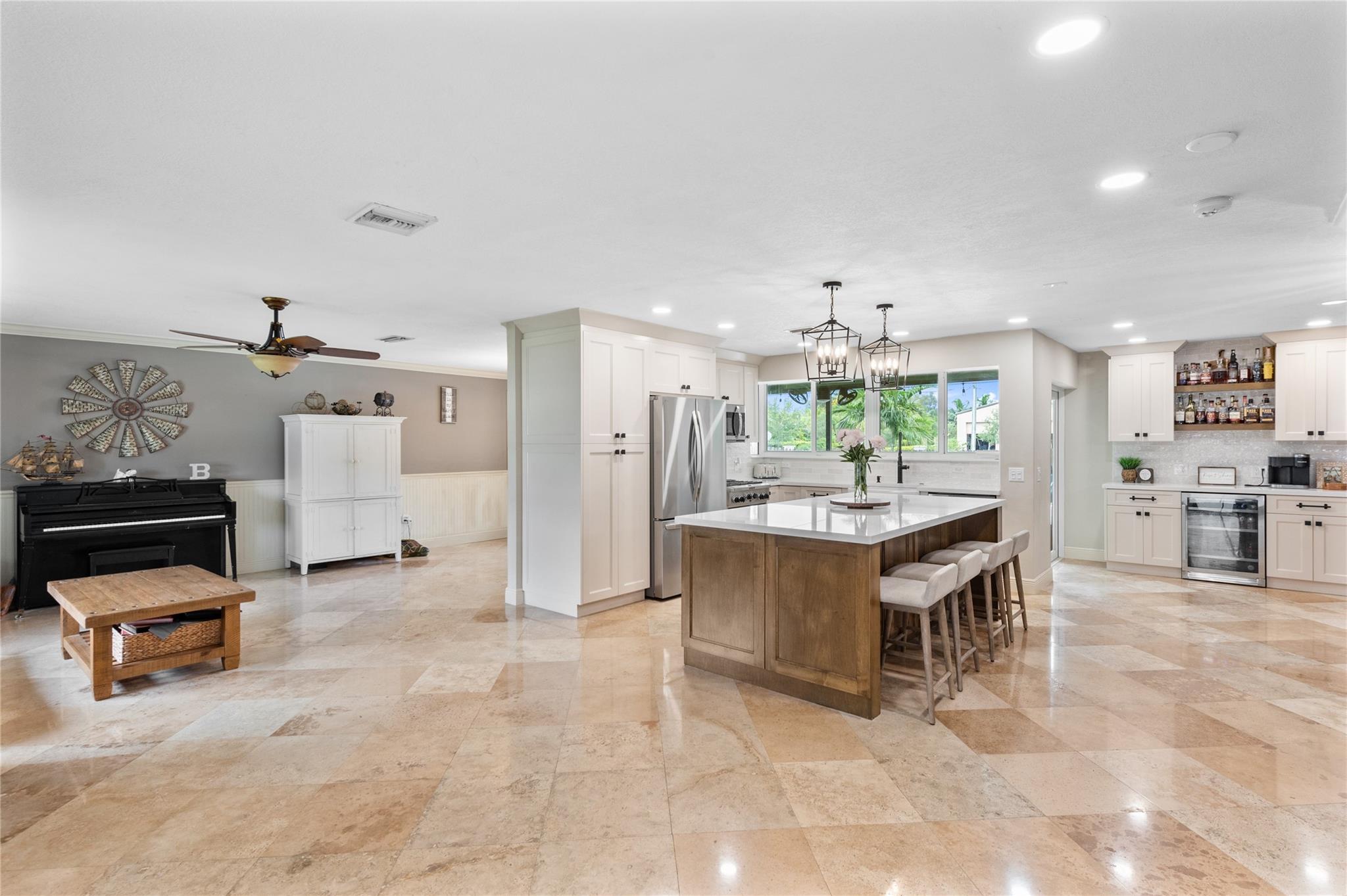 with view of Kitchen, Coffee/Wine bar, Living/Dining areas with access to pool/patio area