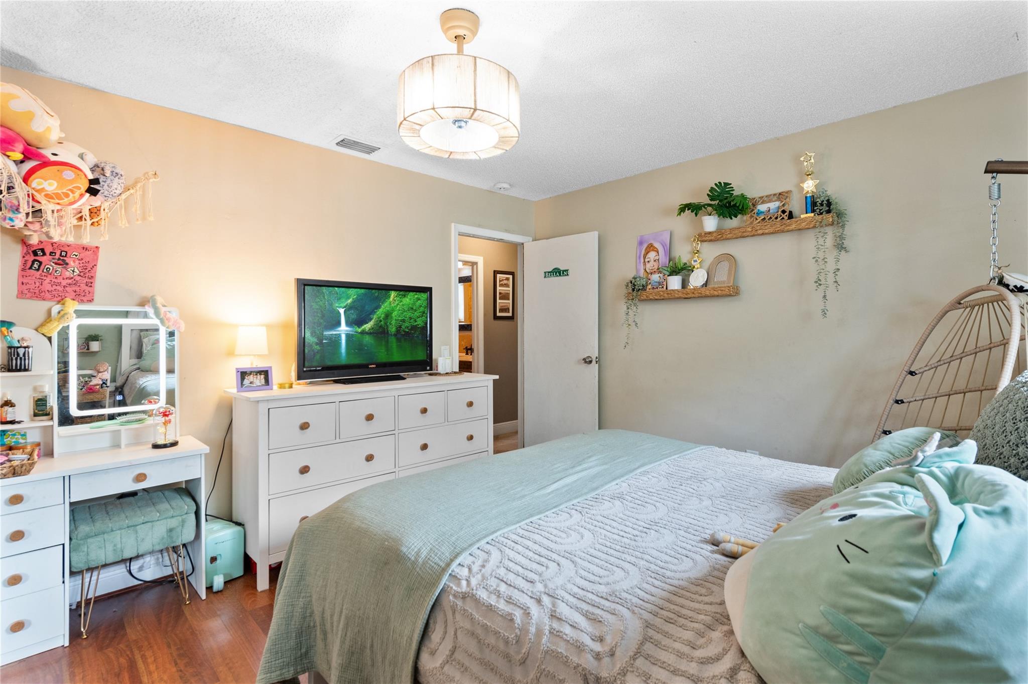 1 of 3 secondary bedrooms and one of 4 bedrooms total