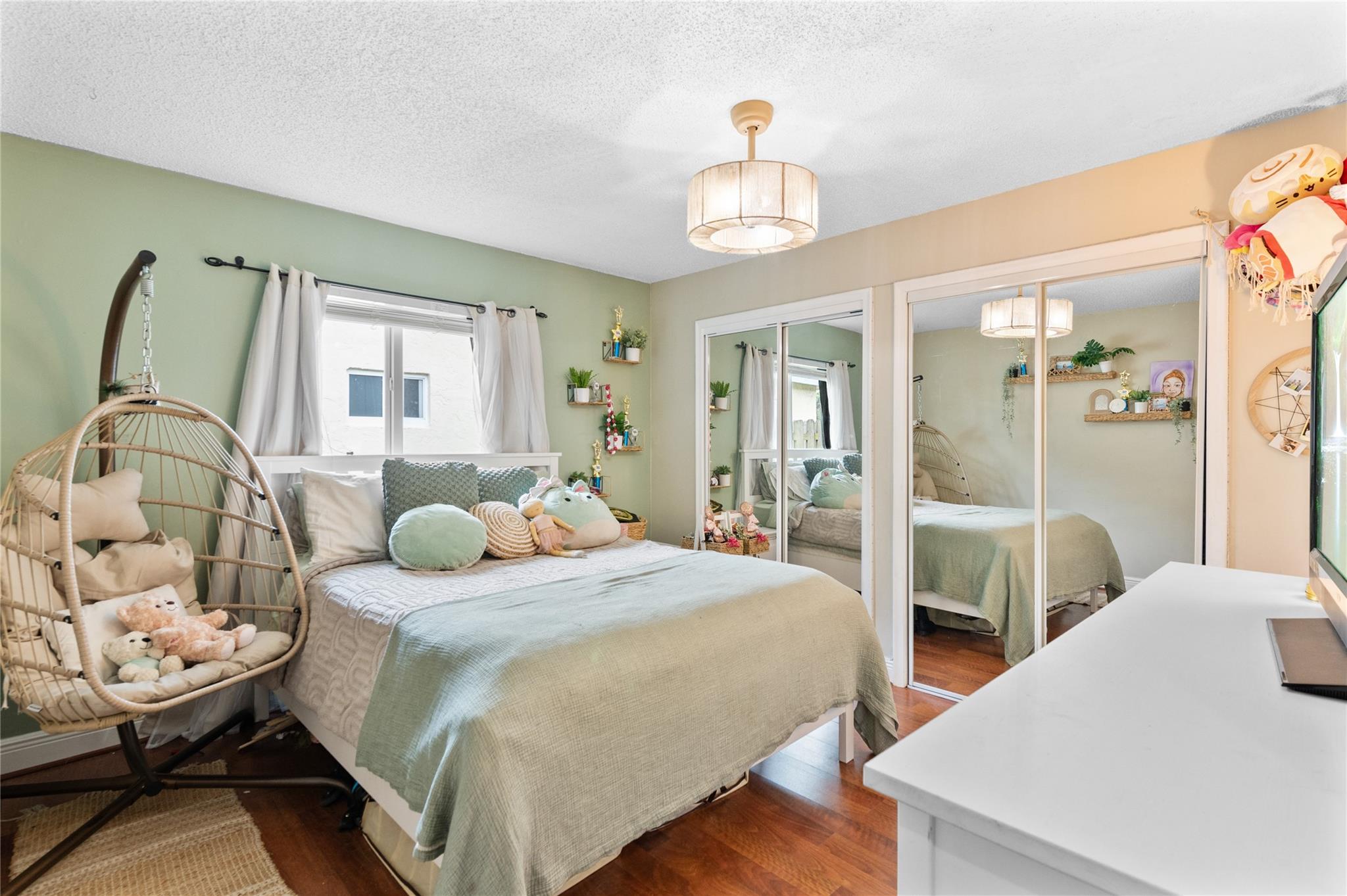 1 of 3 secondary bedrooms and one of 4 bedrooms total