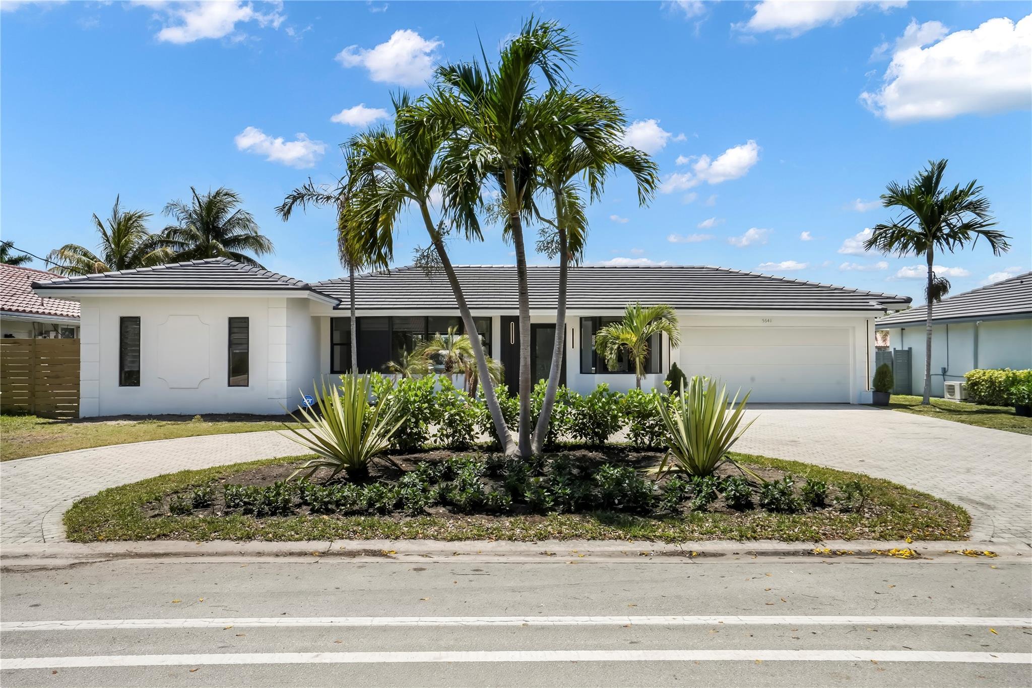circular driveway parks 8 car plus a 2-car garage