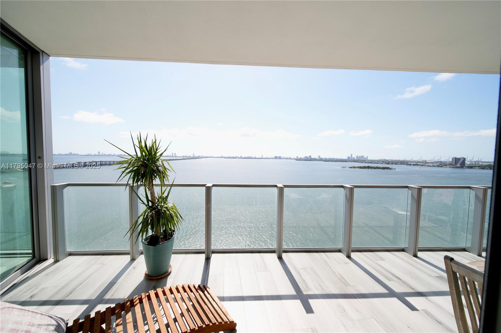 Experience luxury living in this 2-bedroom plus den, 3-bathroom residence at Biscayne Beach. This 1,223 sq ft unit features a private elevator opening directly into the foyer, a spacious balcony with stunning water views, and floor-to-ceiling windows that flood the space with natural light. The modern kitchen is equipped with Miele® stainless steel appliances, including a stovetop, oven, hood, microwave, dishwasher, and refrigerator, complemented by granite countertops. Additional features include a walk-in closet, upgraded vanity, and full-size washer/dryer. Residents enjoy resort-style amenities such as two pools, cabanas, a beach club, fitness center, spa, and 24-hour concierge service. . Located in the heart of Edgewater, steps from Wynwood, Midtown, and the Design District.