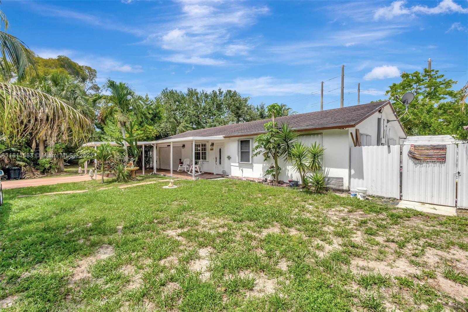 Don’t miss this unique opportunity to own a versatile property with ample space and natural charm! This 3-bedroom, 2-bath home includes a private guest suite featuring a fully remodeled 3/1 layout with a massive closet — ideal for extended family, guests, or rental income. The main home offers a cozy living room, a traditional kitchen, and a Florida room perfect for relaxing or entertaining. The roof was updated in 2008 for added peace of mind. Included in the sale is the adjacent 1.33-acre lot, bringing the total land size to 2.66 acres, offering endless possibilities for expansion, gardening, or recreation. Step outside and enjoy your very own tropical oasis, with mature tropical trees. A rare find with comfort, flexibility, and valuable land. !Pics coming soon!