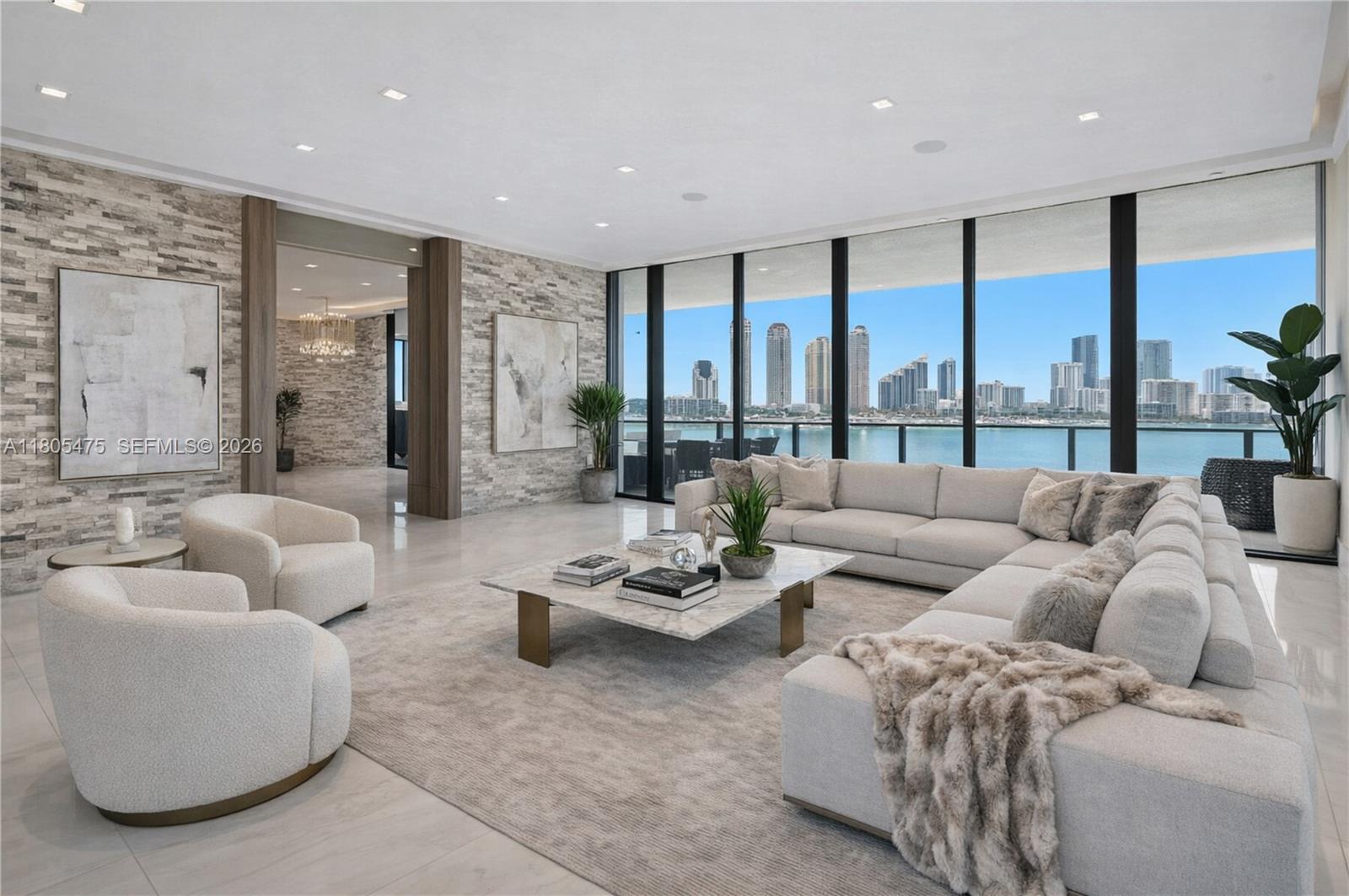 UPDATED!!! Wallpaper removed and a fresh coat of paint throughout. Welcome to Residence 803 at Prive, a luxury retreat on a private island. Spanning 8 lush, waterfront acres, and panoramic views. A stunning 3-bed, 4.5-bath flow-through residence, plus a dedicated staff room, boasts 2,750 sqft of meticulously designed living space & Miele appliances in the kitchen. Enjoy sweeping vistas of the ocean, Intracoastal, and city skyline w/2 expansive terraces, w/a summer kitchen. Enter through a private foyer into a residence with thoughtful design. Prive’s resort-style amenities include: 2 swimming pools, fitness center, a private restaurant, wine & cigar lounge, Spa, tennis court, 24-hour concierge & valet, private marina accommodating up to 150 ft vessels.