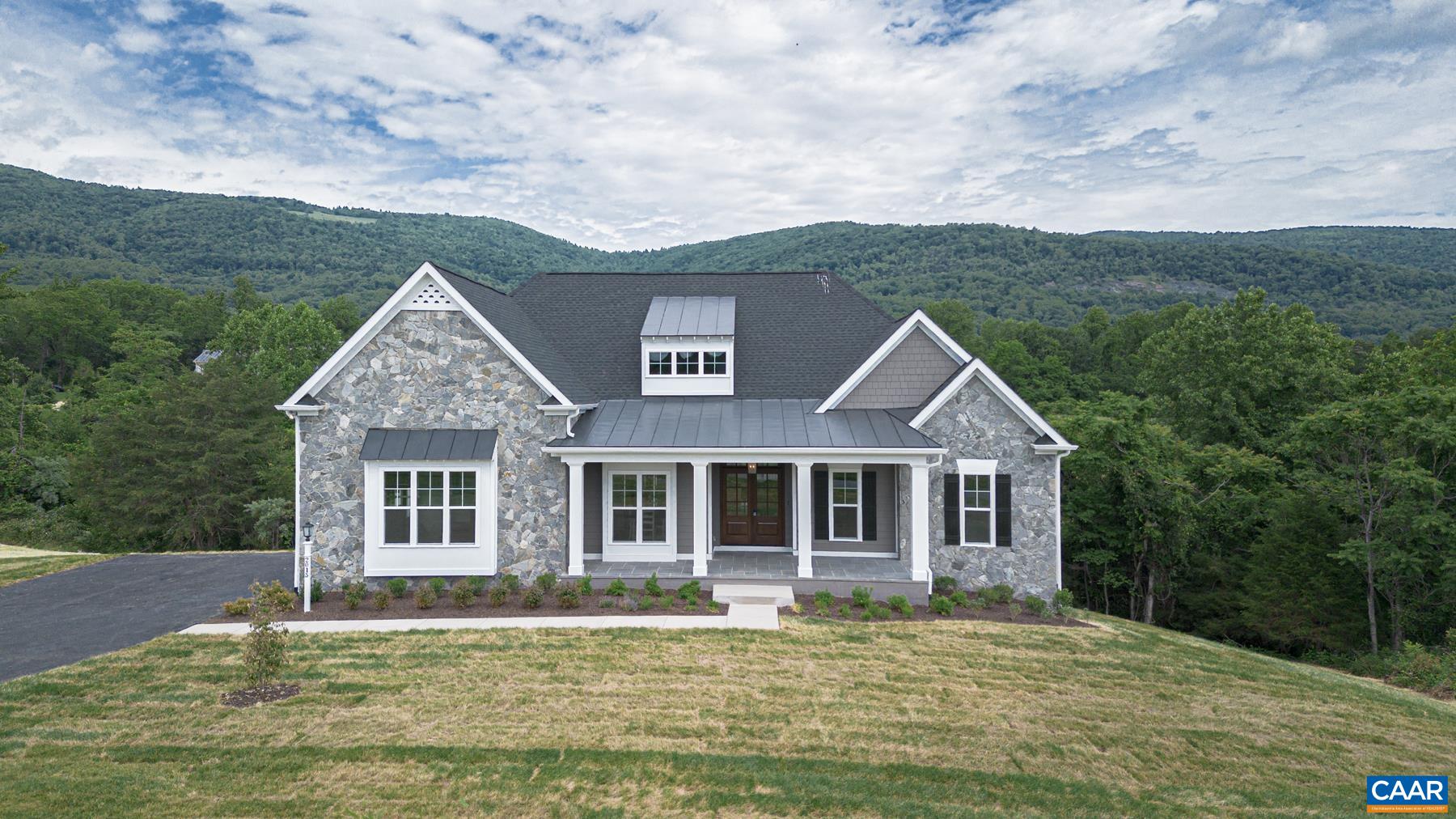 Completed desirable Newport available for purchase and quick move-in! The highly sought after Newport plan offers a light-filled main level with a private study, spacious owner's wing, inviting great room with vaulted ceiling, upgraded kitchen, dining room, two secondary bedrooms with a full bath to share, 2-Car side load Garage, oversized Trex Screen Porch w/ vaulted ceiling & uncovered Trex deck. The walkout basement with finished rec room, bedroom and full bath provide additional SF and entertaining spaces giving a terrace level feel with an abundance of natural light, plus great storage areas and easy to access mechanicals! Quality included features throughout like 2x6 exterior walls, custom Mahogany front door, Gas Log Fireplace with built-ins, wood shelving throughout, 15 SEER HVAC with separate zones, plus much more. With selections made by our talented Design Coordinator, this home is breathtaking inside and out! Photos are of the actual, completed home.