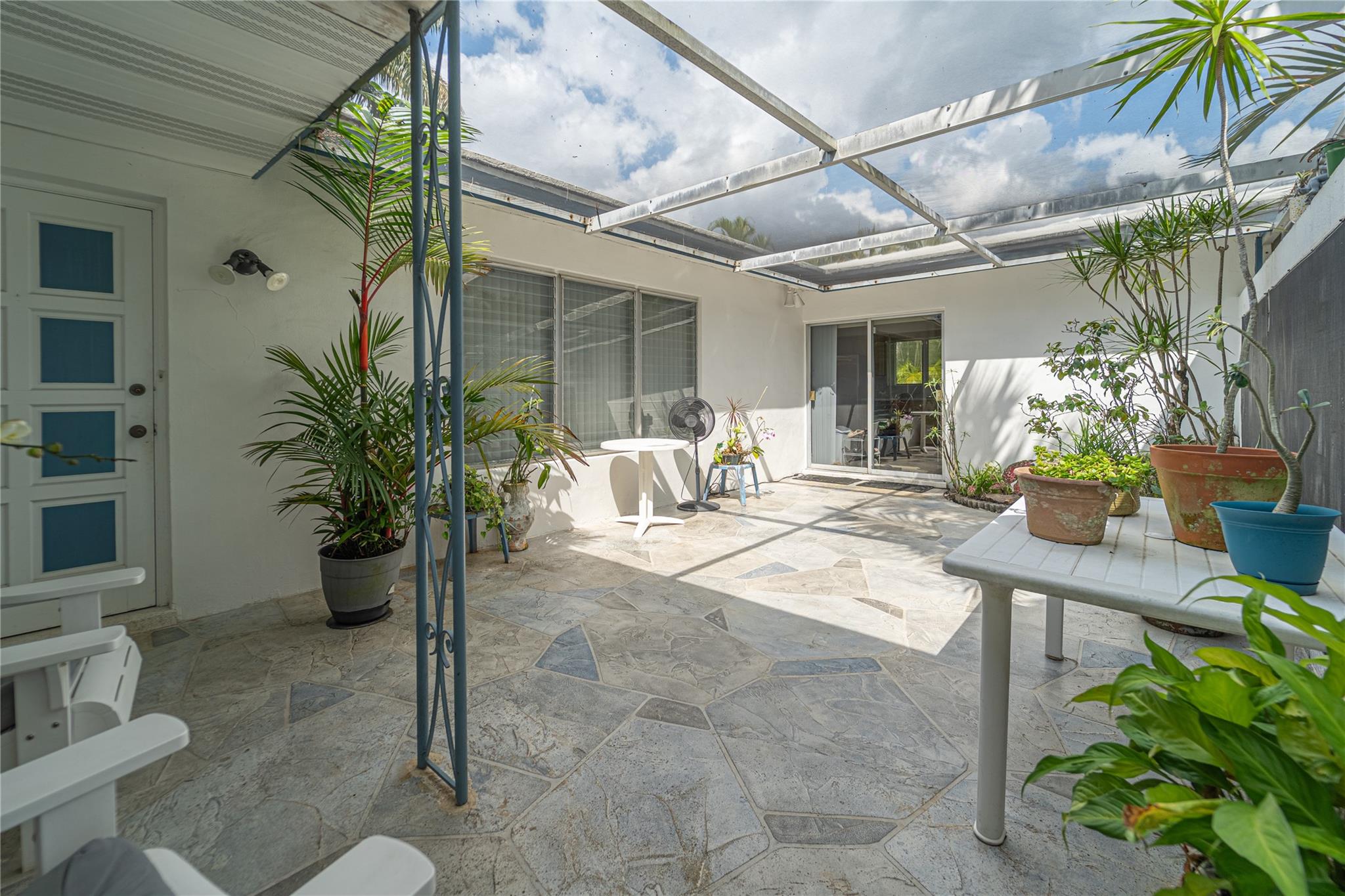 Garden entryway with fountain in the corner