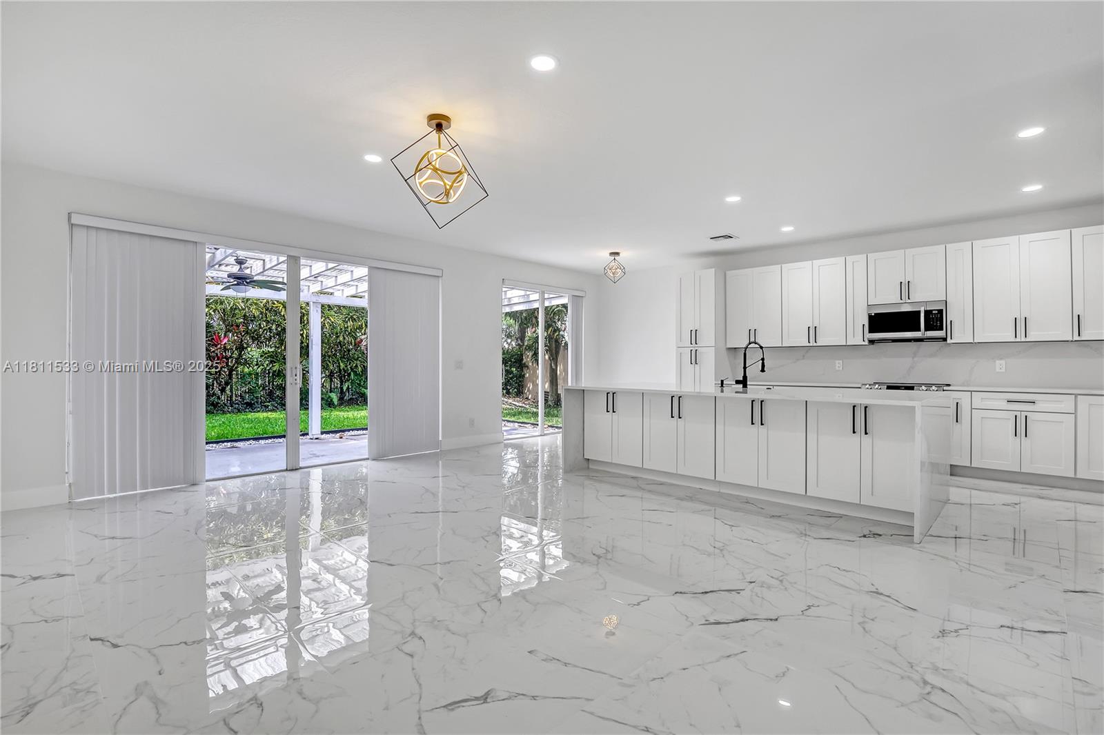 Beautifully updated 5BR/3BA residence in the sought-after gated community of Colony Preserve. This spacious two-story home offers a layout with one bedroom and full bath on the first floor, perfect for guests or extended family. The first level features elegant 24x48 white porcelain tile, soaring ceilings, and an open-concept design ideal for entertaining and everyday living. The fully remodeled kitchen includes a marble island, premium Samsung appliances, built-in oven/microwave, StormWash™ dishwasher, wine and beverage cooler, and smart rotating corner drawers. Upstairs features three bedrooms, a laundry area with Samsung washer/dryer, a Nest thermostat, and a separate A/C unit for efficient zoned cooling. Move-in ready and thoughtfully designed for modern comfort and convenience.