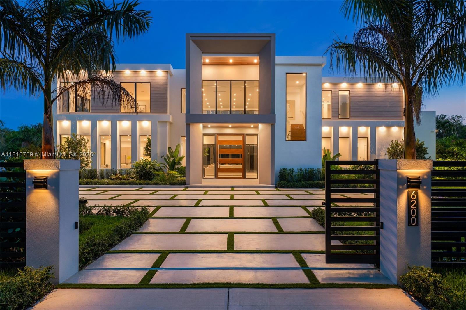 Discover this stunning new 2025-built estate in Pinecrest, where elegance meets modern design. Behind private gates, this impressive home features 6 bedrooms, 7.5 bathrooms, and a spacious 3-car garage. At its center is a gourmet kitchen equipped with premium Sub-Zero and Wolf appliances, thoughtfully designed for both functionality and style. Upstairs, the primary suite offers breathtaking views of the lush backyard, while the spa-inspired bathroom showcases marble walls, a soaking tub, and a luxurious shower, creating a tranquil retreat. The outdoor space is equally captivating, featuring a sparking pool, built-in barbecue, and beautiful Sylvester Palms, perfect for both relaxation and entertaining.