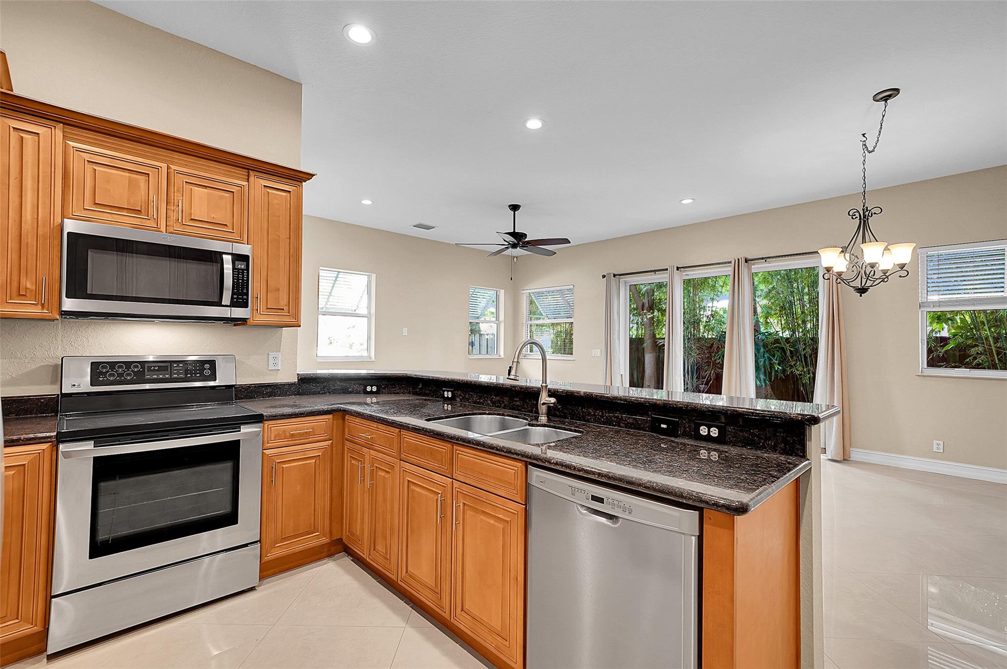 Sapphire Bay stunner! Rare corner townhome (1 of 6!) east of US1, a breezy 1 mile to the beach, pier, and restaurants. Soaring 10-foot ceilings, hurricane-proofed, and a private tropical patio. BRAND NEW AC, Oversized 2-car garage, Large primary bedroom with custom closets, spa-like bath with Intelligent toilet, (double shower + jet tub!), upstairs laundry, and balconies galore. $300 HOA! – HIGH LIFE! Beachside beauty! MOTIVATED SELLER! BRING ALL OFFERS!!