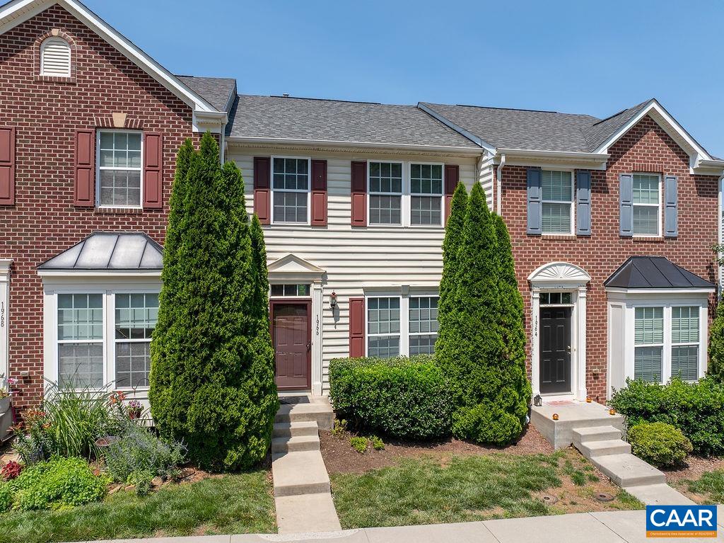 Welcome to 1966 Asheville Drive – spacious townhome in a prime location on Pantops with amazing views conveniently located near Martha Jefferson Hospital, Rt 250 and Interstate 64. This move-in-ready unit features an open main level with hardwood floors, a stylish kitchen with island seating, granite, gas ranges and a pantry. Plus plenty of space for entertaining or relaxing in the living or dining spaces or rear deck and enjoy the stunning views. Upstairs, the generous primary suite offers a large walk-in closet and a beautifully appointed bathroom with dual vanities, a soaking tub, and a separate shower. The finished basement adds even more versatility with a half bath, bonus living area, and additional storage space – ideal for a home office, gym, or guest retreat. Two designated parking spots plus guest spots nearby. With freshly cleaned carpet and fresh paint, this home is ready for the new owner! Motivated Seller!