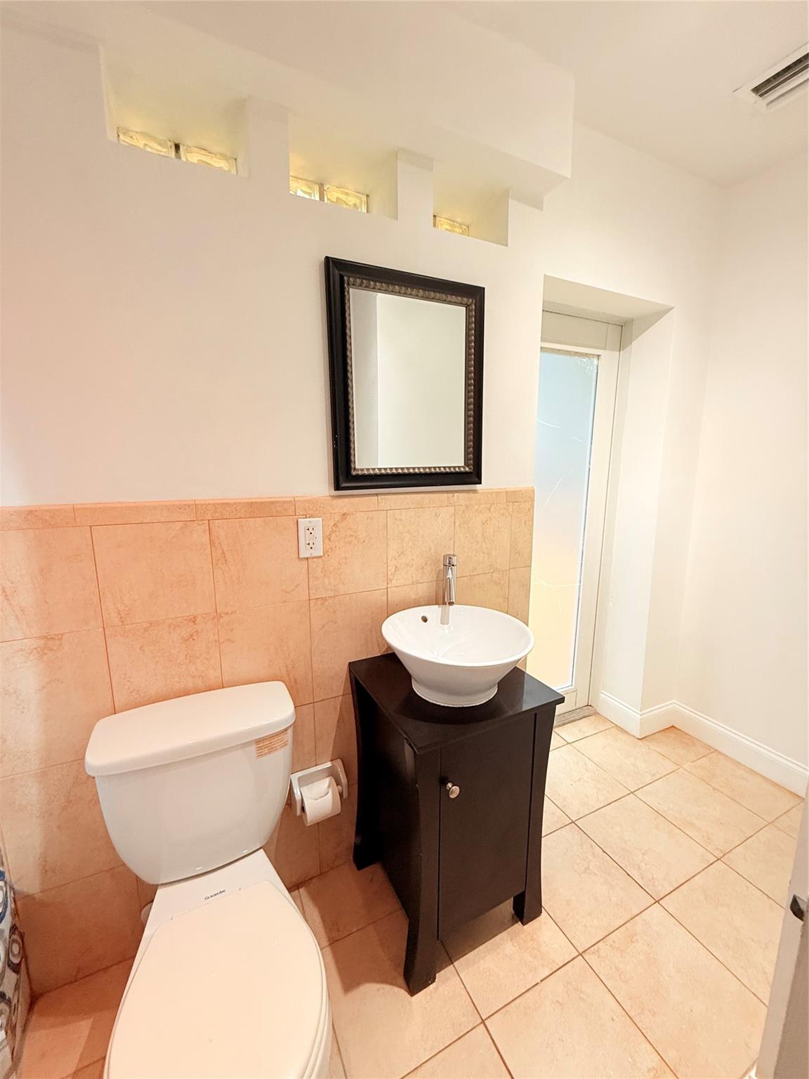 Second View Master Bathroom with exit to the deck