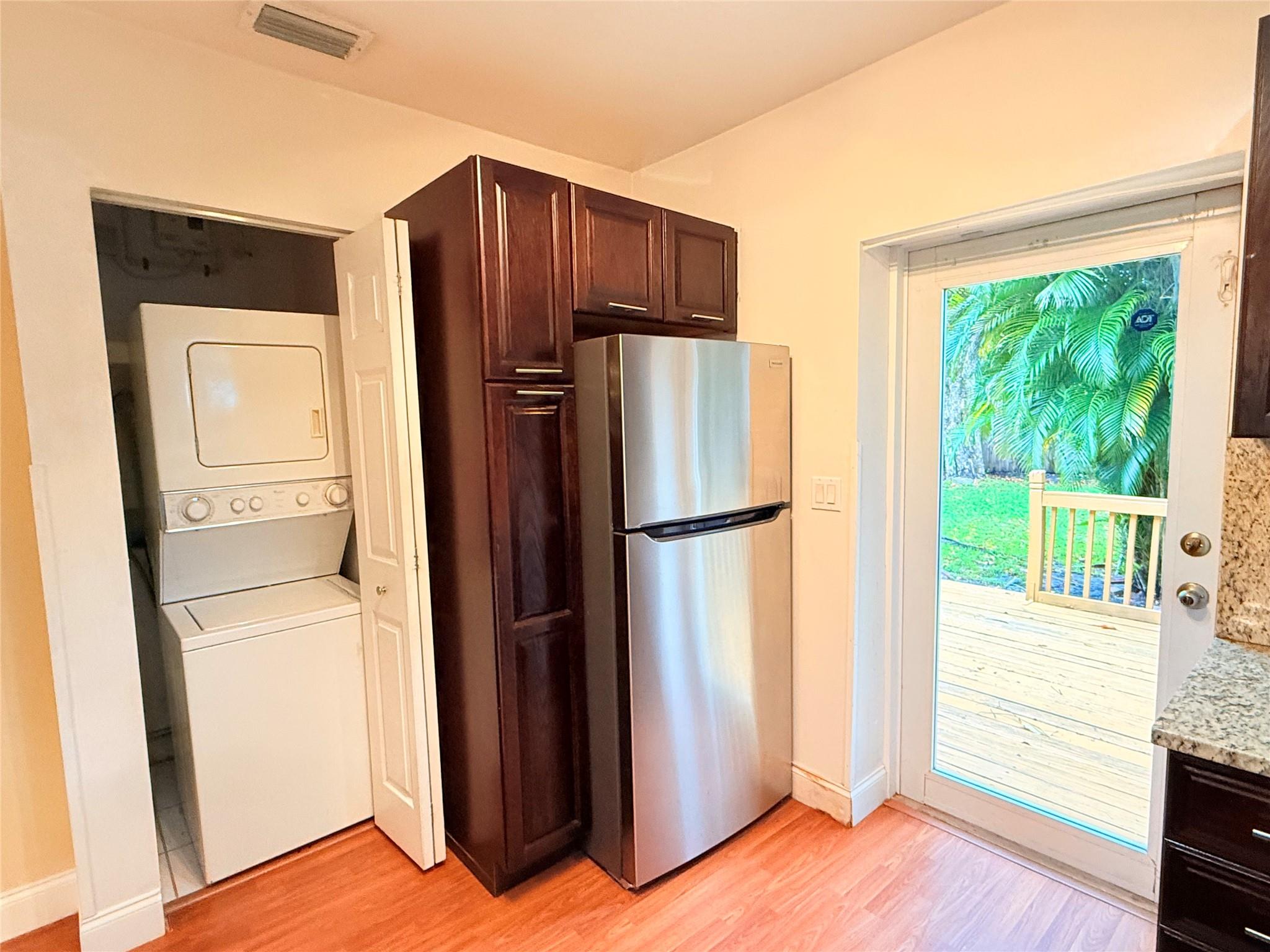 Kitchen with exit to the Backyard Deck