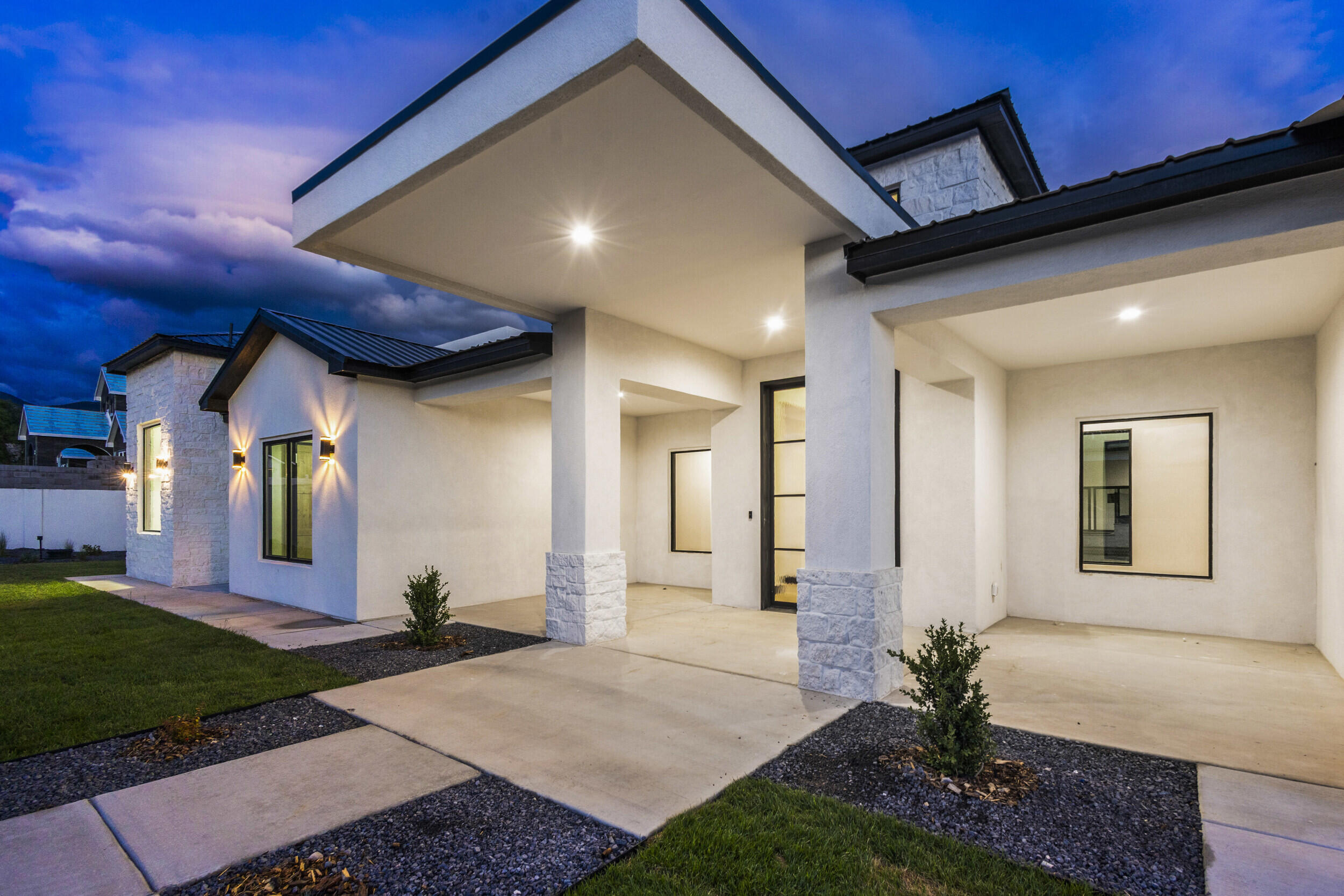 A true statement of luxury and scale in North Albuquerque Acres, this extraordinary 6,010 sq ft estate redefines high-end living. With 5 spacious bedrooms, 5 baths, and an 8-car garage, the home is designed for comfort and grandeur. Soaring ceilings, a chef's kitchen with Monogram appliances, and multiple living and entertainment spaces--including a private gym and theater it offers an unmatched lifestyle. The opulent primary suite boasts dual walk-ins and a spa-like bath creates an unmatched environment.  The custom pool is the focal point of this amazing home and it has been crafted with precision and elegance by renowned master builder Candelaria Homes.  Call today for you private tour of Albuquerque's newest and grandest luxury home!