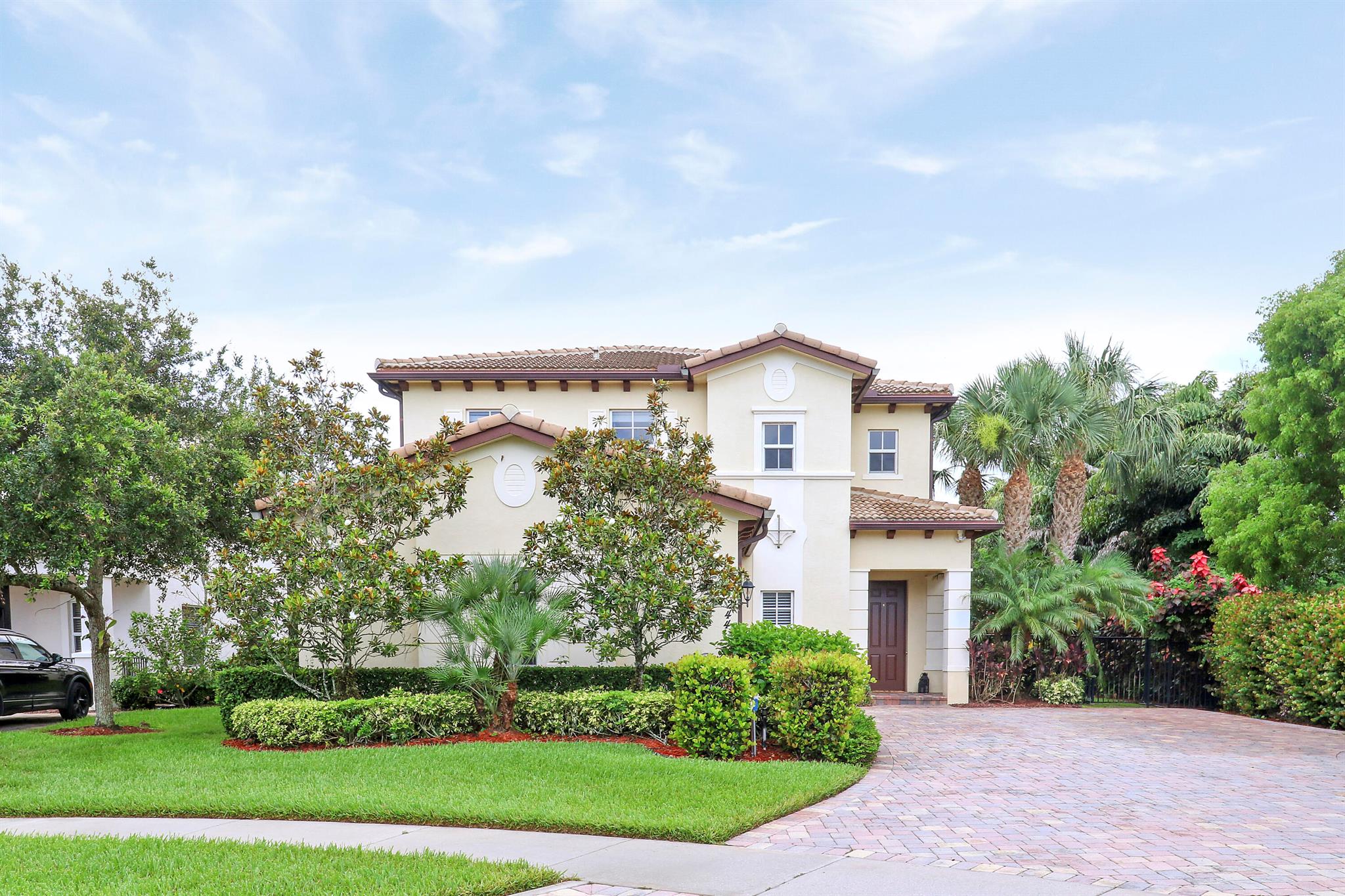 Don't miss this Murano model located in the highly desirable Rialto community of Jupiter! This home features 4 bedrooms and 2.5 baths, complete with impact glass windows and doors for added safety and energy efficiency. Situated at the end of a cul-de-sac, this property offers privacy with its extended driveway. The expansive backyard provides ample space for a pool, making it perfect for outdoor entertainment. Additionally, all closets are thoughtfully designed for optimal space utilization, new flooring was recently installed and a NEW AC will keep you cool for years to come.  Nestled within a gated community, Rialto provides a secure and peaceful setting complemented by an array of amenities such as a 3,000 square foot clubhouse, fitness center, and playgrounds, tennis & pickleball