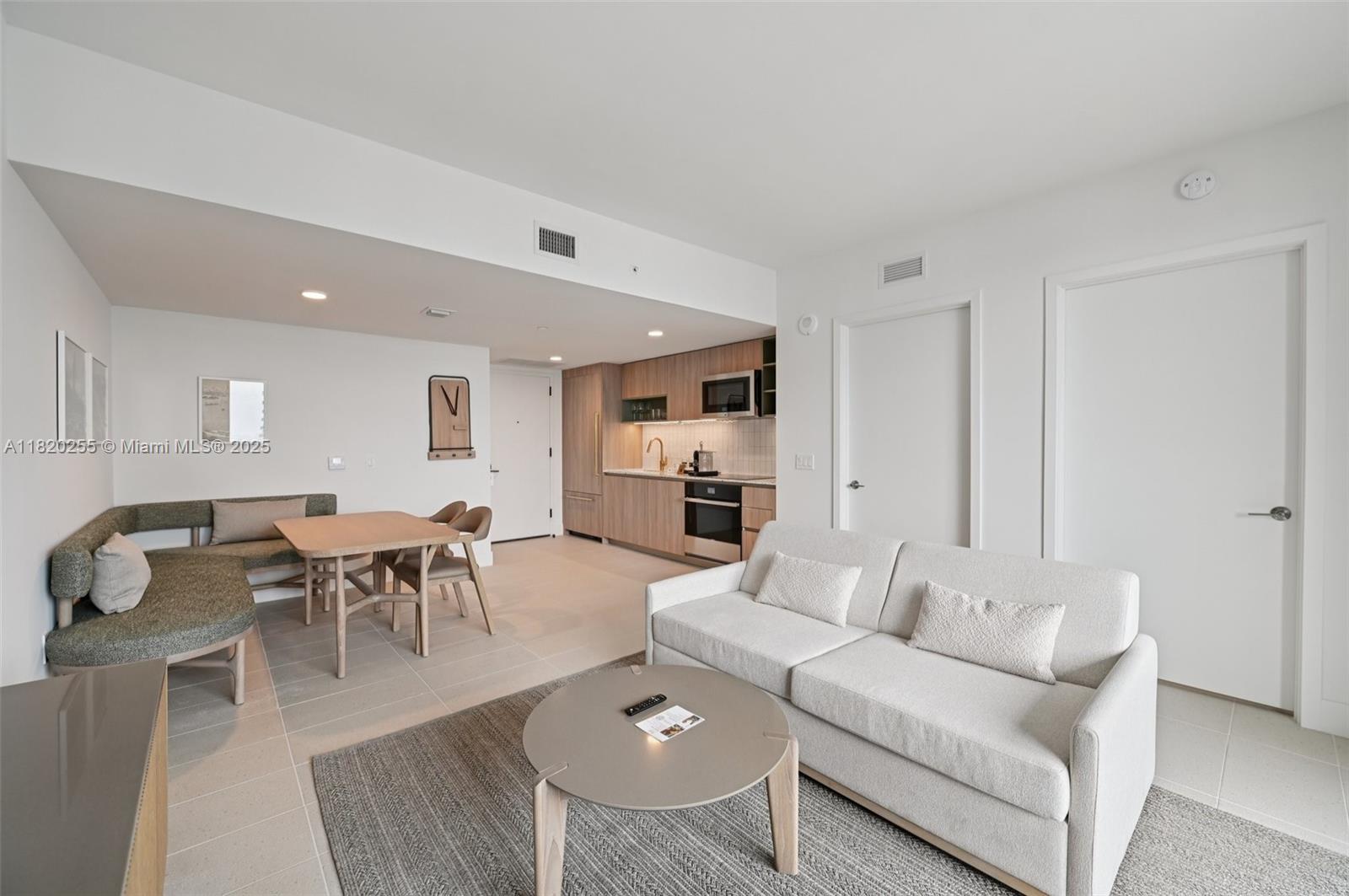 Discover Unit 4409 at Natiivo Miami, a fully furnished, move-in-ready 1 bedroom, 1 bathroom residence offering 912 sq ft of bright, open living space. Perched on a high floor, this spacious unit features floor-to-ceiling impact windows, a sleek open layout, and a private balcony with stunning views of Biscayne Bay and the Miami skyline. It’s approved for short-term rentals (Airbnb/VRBO), making it a great fit for both personal use and investment. Natiivo offers over 70,000 sq ft of resort-style amenities, including a rooftop pool, state of the art gym, yoga lounge, co-working areas, and on-site dining, all in the vibrant heart of Downtown Miami.